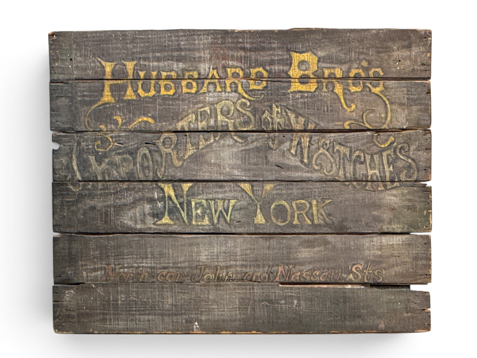 Hubbard Bros. Watches Advertising Sign: A Hubbard Bros. Importer of Watches, New York, advertising sign, on a beadboard panel. 21in tall x 26in wide. | You have additional shipping options, and are not required to use Live Shipping. Additio