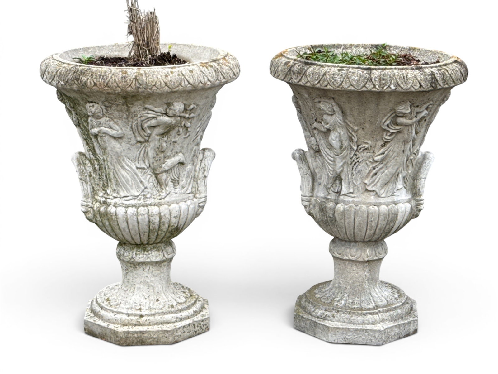 Pair of Neoclassical Style Cast Stone Garden Urns: A pair of Neoclassical style cast stone garden urns with figural designs, by Henri Studios. 32in tall x 22in wide. | You have additional shipping options, and are not required to use Live Shipping. Ad