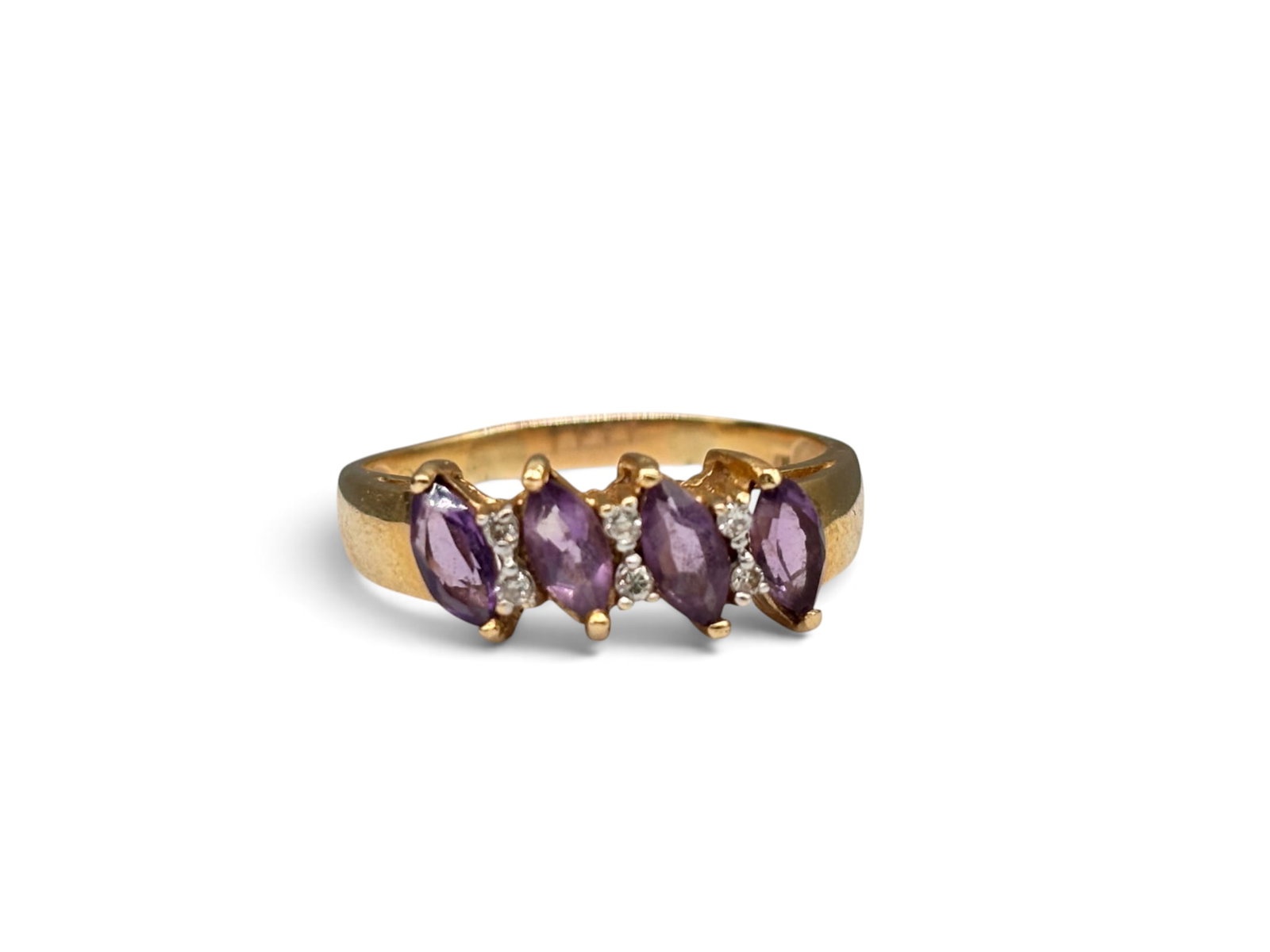 14K Amethyst and Diamond Ring: A 14K yellow gold ring with four marquise cut amethysts flanked by six intersecting diamonds. Size 9.5. 2.18 dwt. | You have additional shipping options, and are not required to use Live Shipping. Add