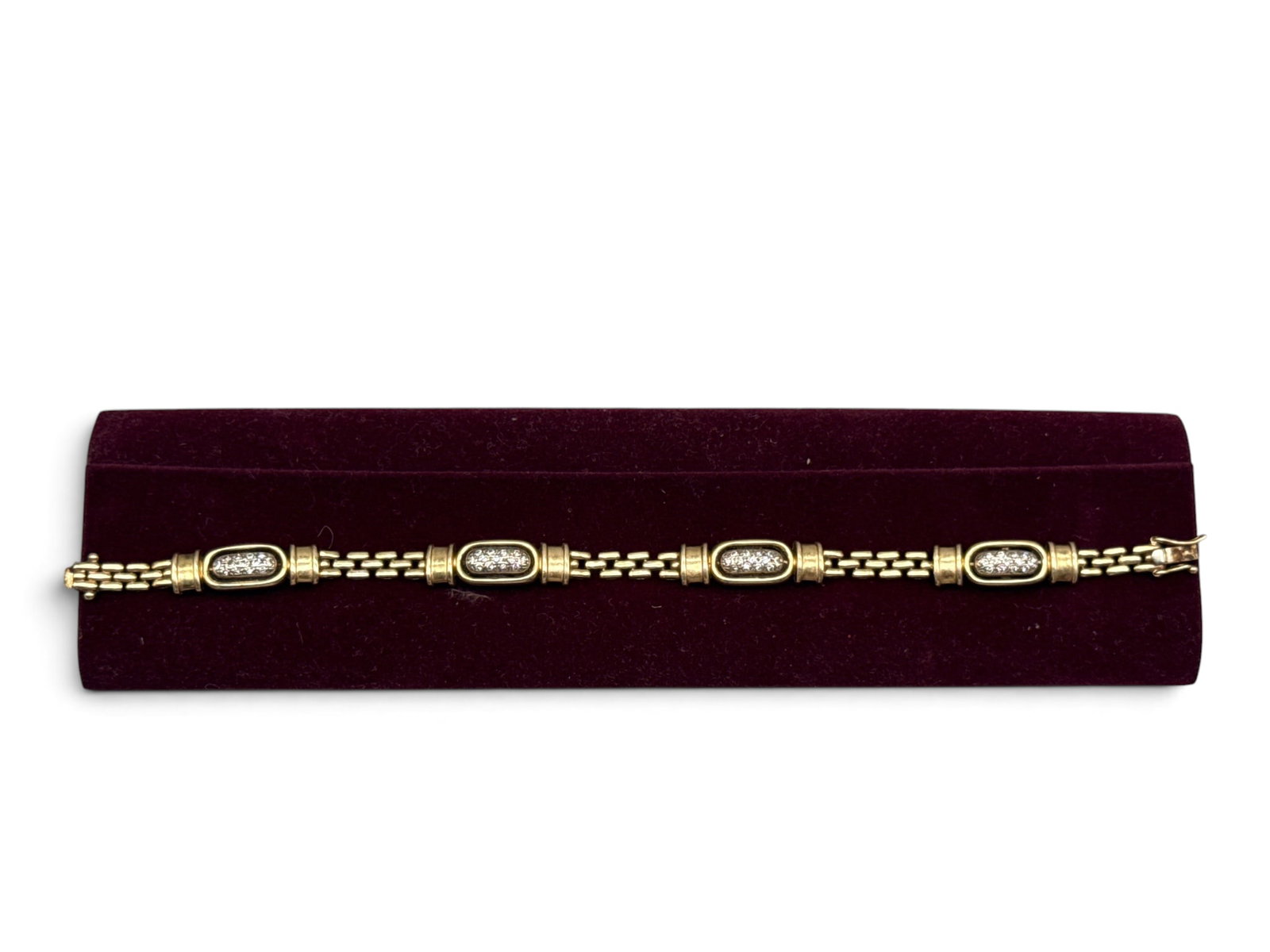 14K Chain Link Pave Diamond Bracelet: A 14K yellow gold chain link bracelet with ovoid centerpieces and pave diamonds. Marked 14K. 8in long. 15.36 dwt. | You have additional shipping options, and are not required to use Live Shipping. Add