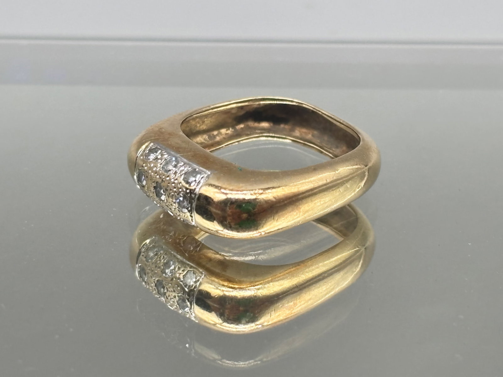 14K Modernist Square Form Diamond Ring: A 14K yellow gold modernist, square-form ring with nine round cut diamonds. Size 6. Tests as 14K. 3.34 dwt. | You have additional shipping options, and are not required to use Live Shipping. Additiona