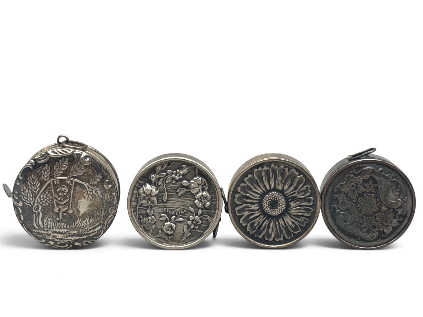 Four Early 20th C. Silver Tape Measures (1 of 9)