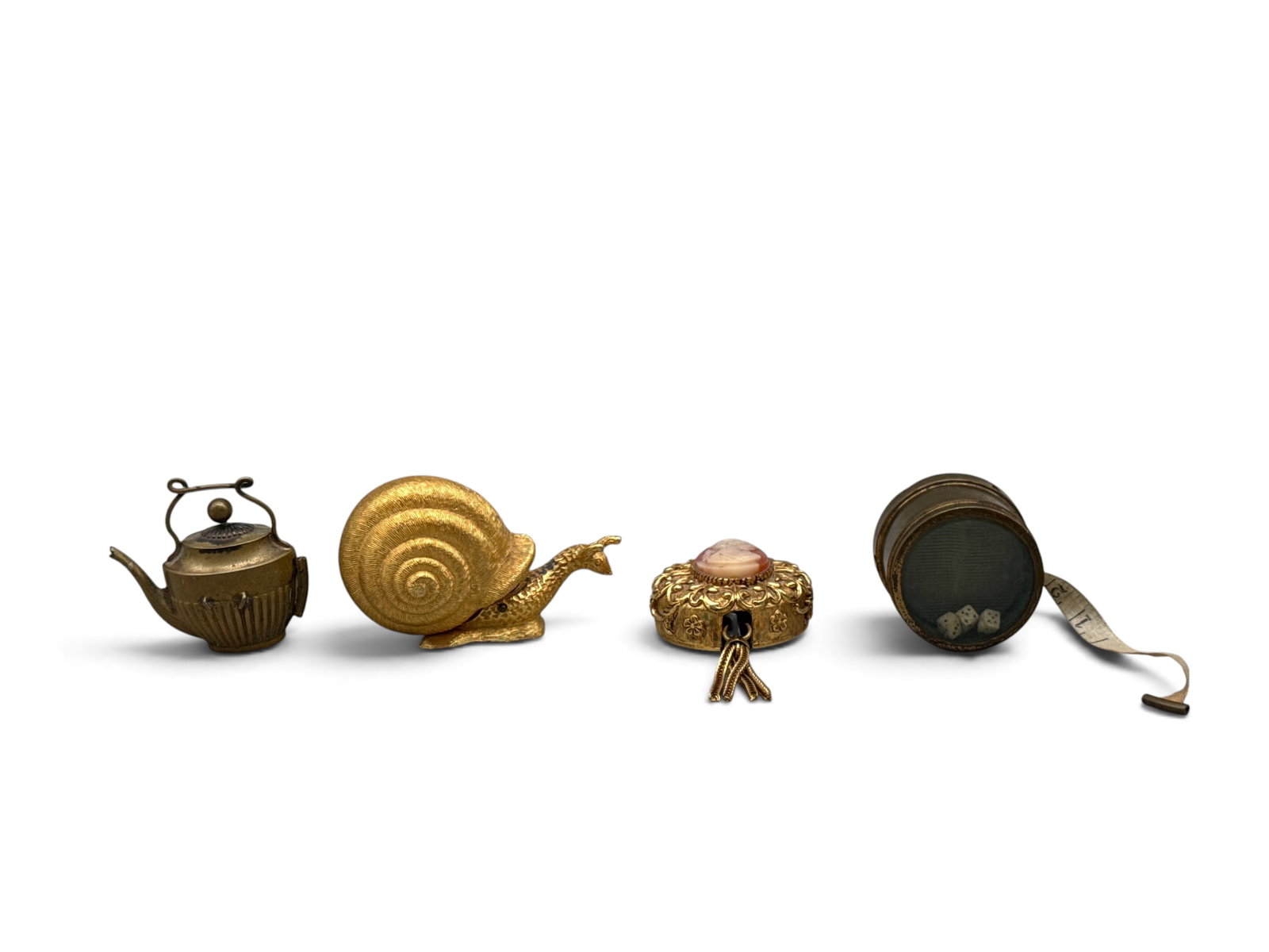 Four Brass Figural Tape Measures (1 of 7)
