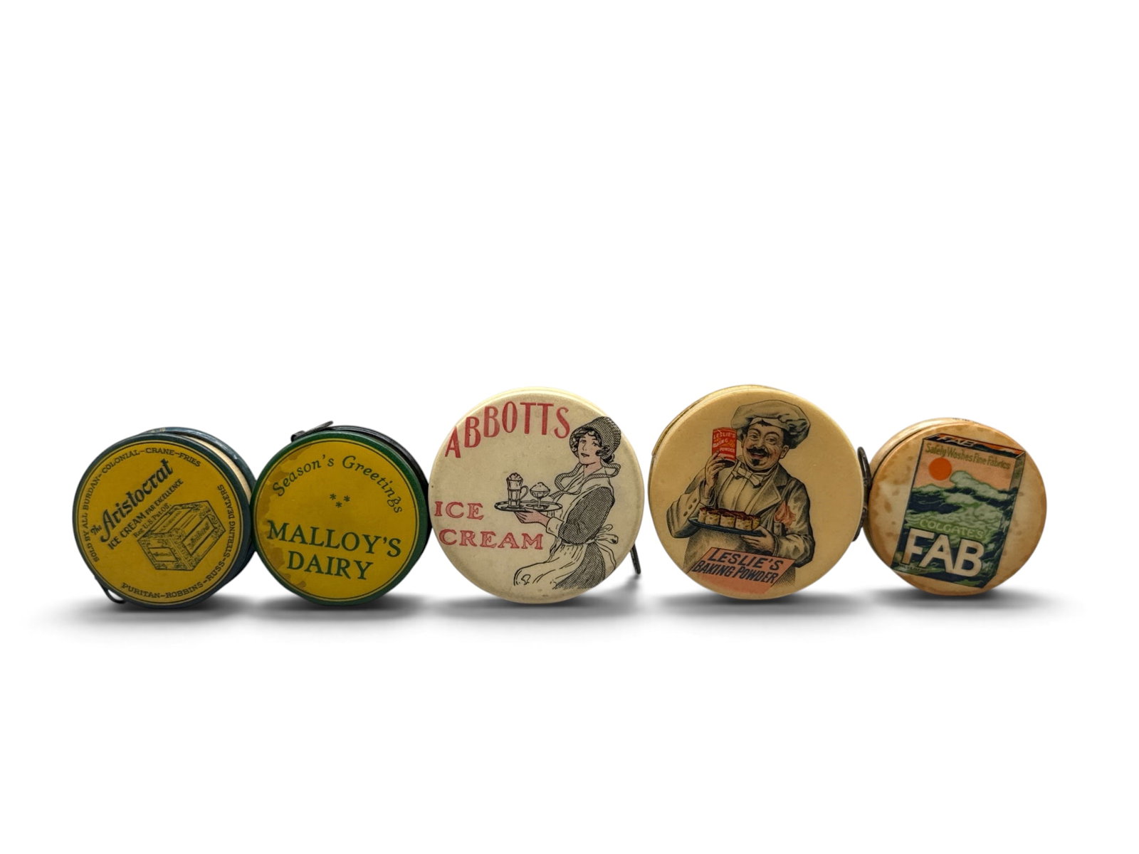 Five Celluloid Advertising Tape Measures (1 of 11)