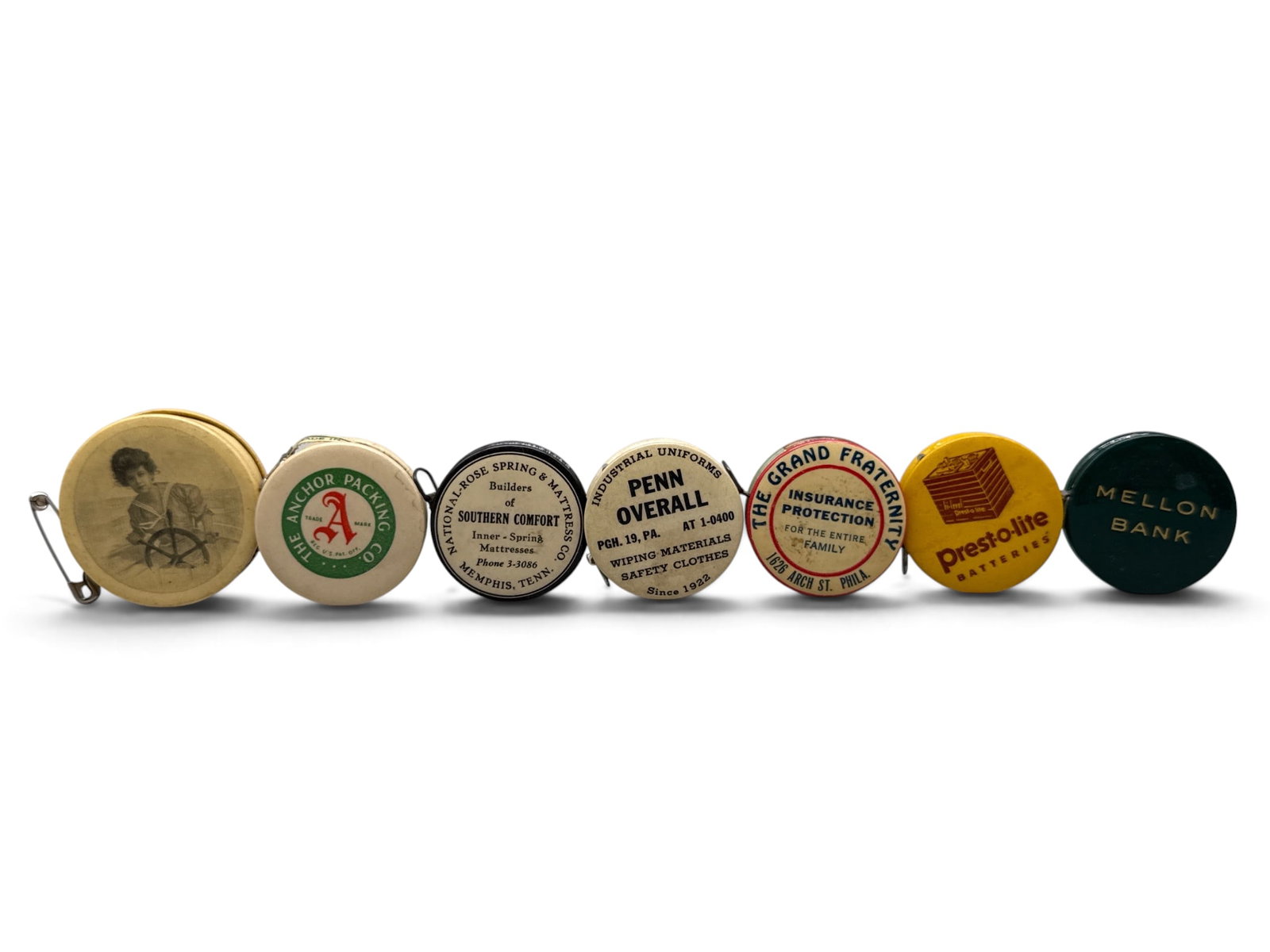 Seven Celluloid Advertising Tape Measures: Seven early 20th C. celluloid advertising tape measures to include Melon Bank, Penn Overall, National Rose Spring and Mattresses, The First National Bank of Oakmont, The Grand Fraternity, The Anchor