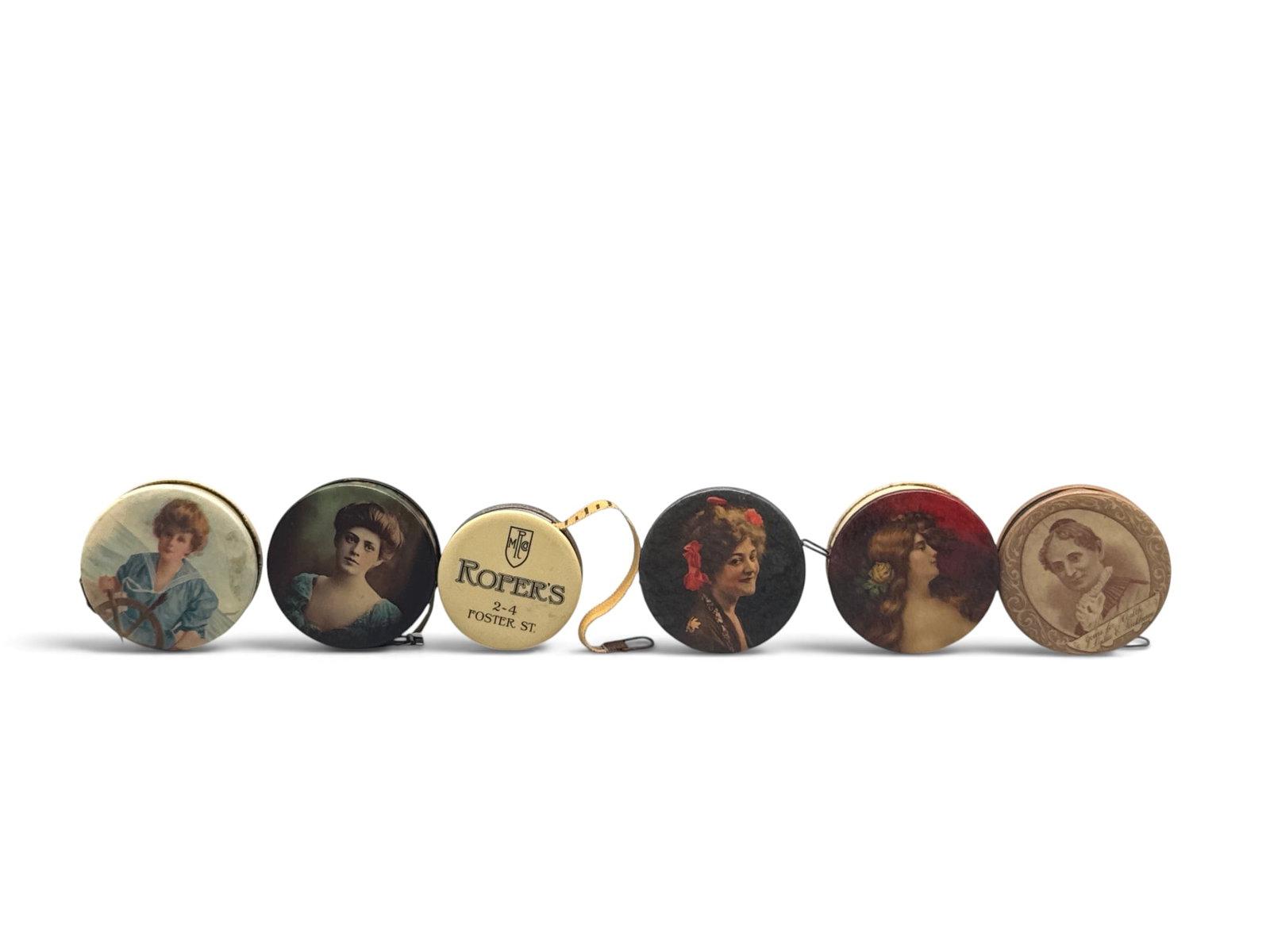 Six Victorian Celluloid Advertising Tape Measures (1 of 13)