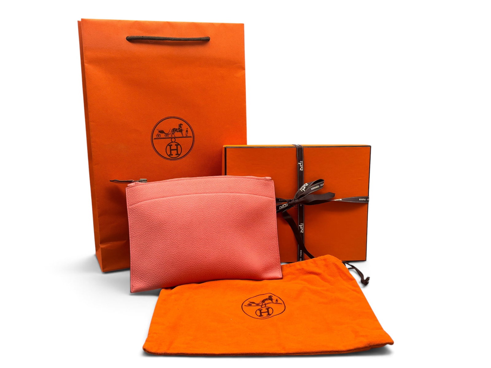 Hermes Togo Bazar Leather Pouch: An Hermes Togo Bazar pink leather pouch with zip closure. Zipper is marked Hermes. Includes dust bag, box with ribbon, and shopping bag. 7-1/2in tall x 10in wide. | You have additional shipping option