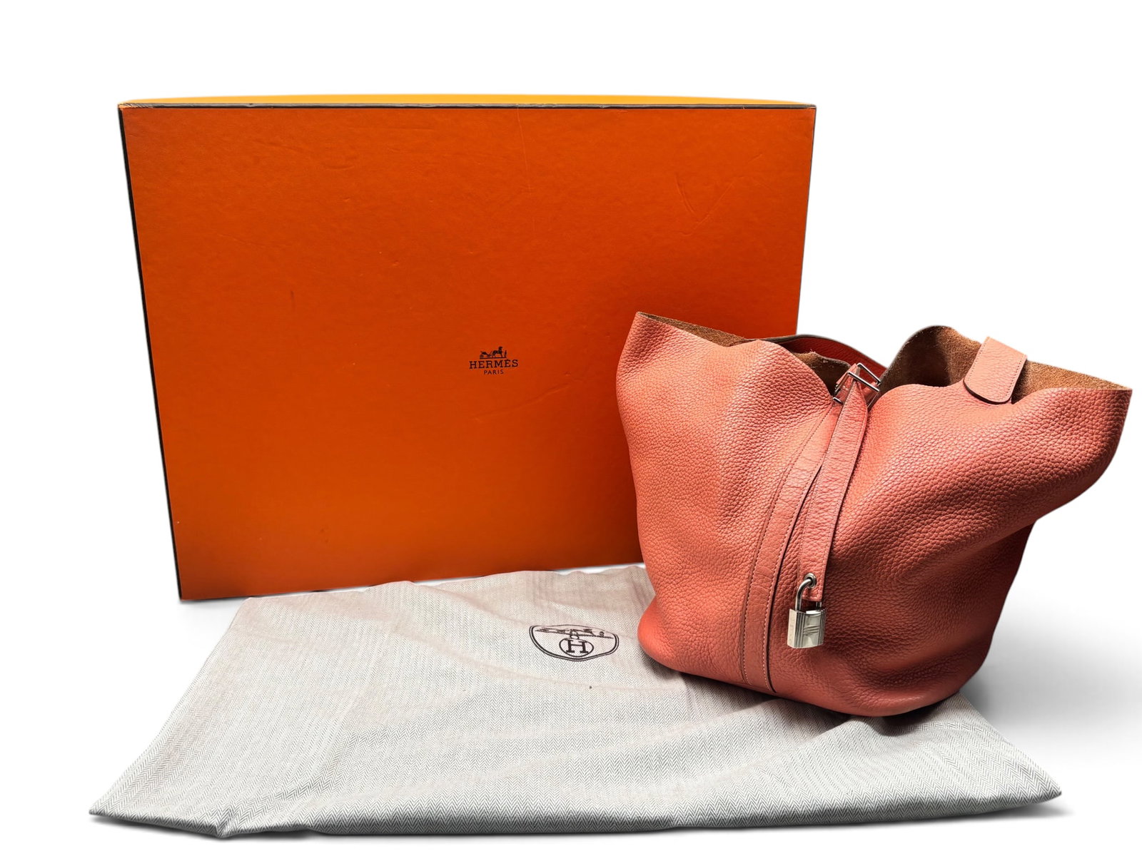 Hermes Picotin Lock GM Handbag: An Hermes Paris Picotin Lock GM handbag in crevette with Taurillon Clemence leather and palladium silver lock. Marked Hermes. Includes box, dust cloth and original receipt. 10in tall x 11in wide. | Yo
