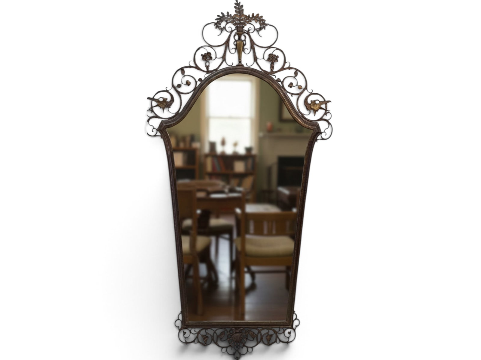 Oscar Bach Signed Bronze Wall Mirror: An Oscar Bach signed bronze wall mirror in a shaped and scrollwork frame with floral design and bird mask sides. Plate signed verso. 56-1/2in tall x 30in wide. | You have additional shipping options, 