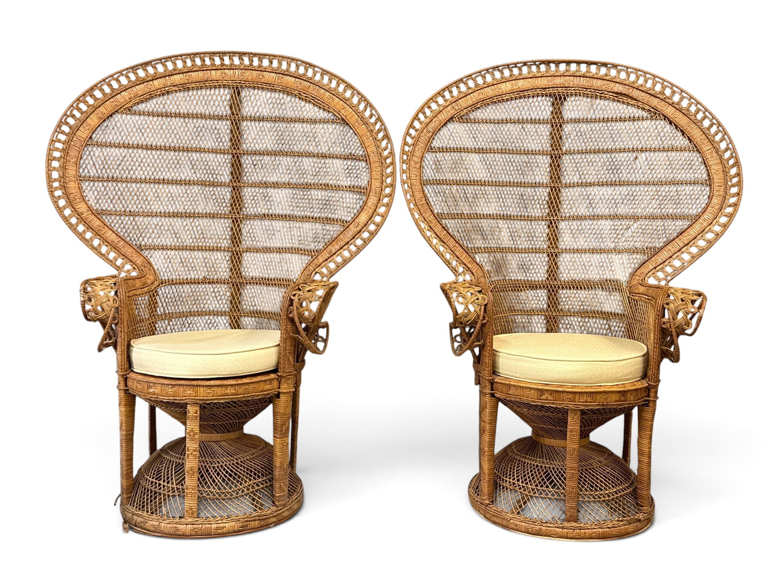 Pair of Wicker Peacock Chairs: A pair of wicker peacock chairs. 58-1/2in tall x 43in wide x 22in deep. | You have additional shipping options, and are not required to use Live Shipping. Additional shipping and delivery details are 