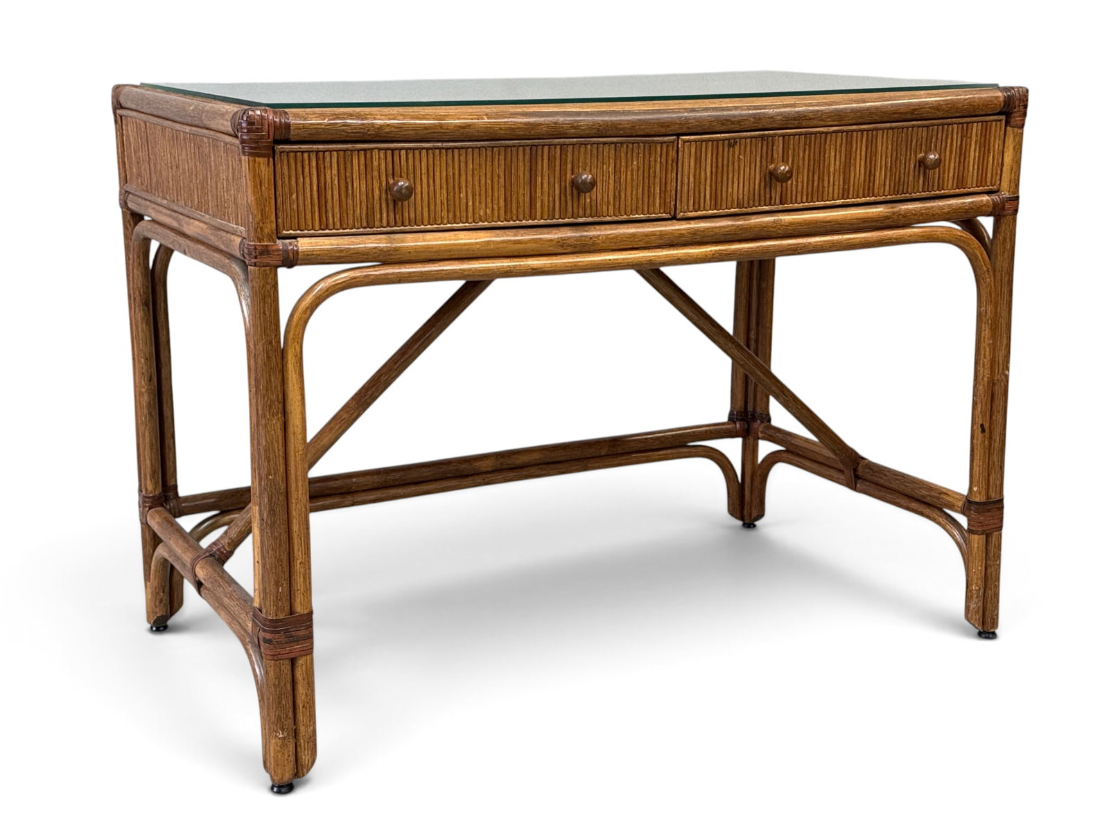 Bamboo Two-Drawer Writing Desk / Vanity: A bamboo rattan two-drawer writing desk or vanity with a glass top and stretcher base. 30-3/4in tall x 42in wide x 24in deep. | You have additional shipping options, and are not required to use Live S