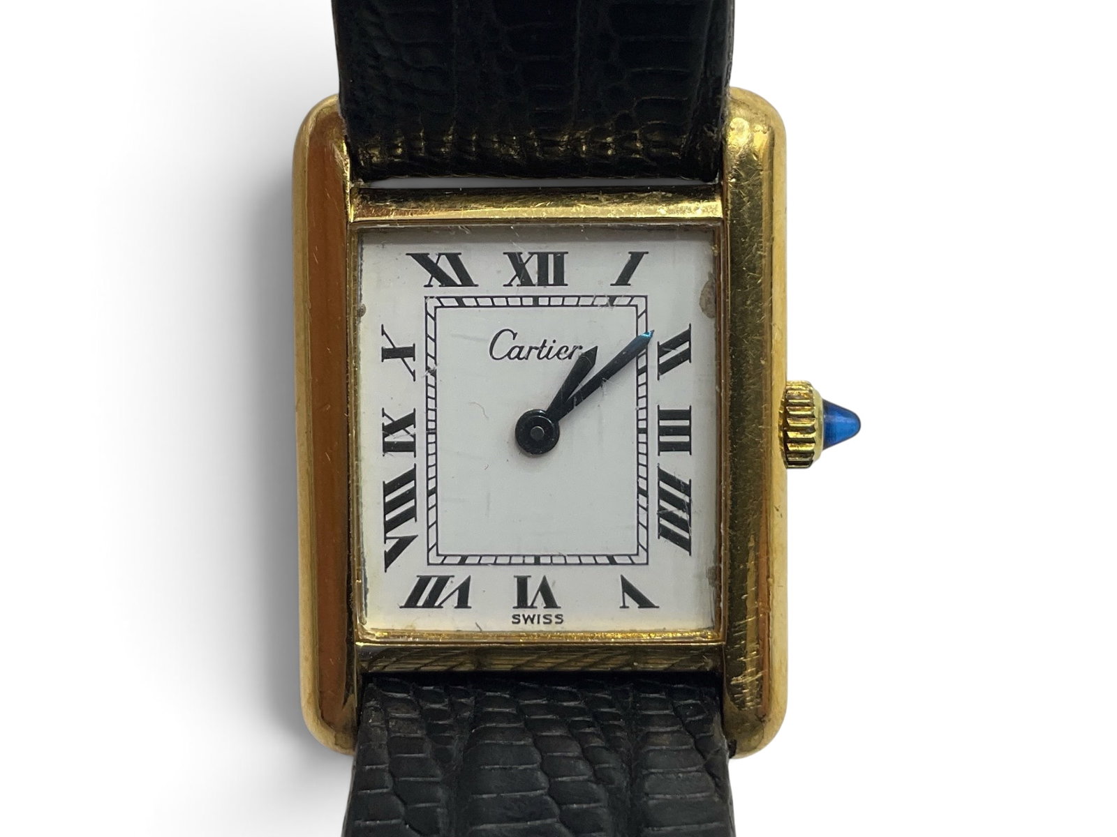 Cartier Tank Must Wristwatch: A Cartier Tank Must wristwatch on black leather strap. Dial is approx. 16mm x 14mm. Small chip on the edge of the porcelain dial. With gift box. | You have additional shipping options, and are not req