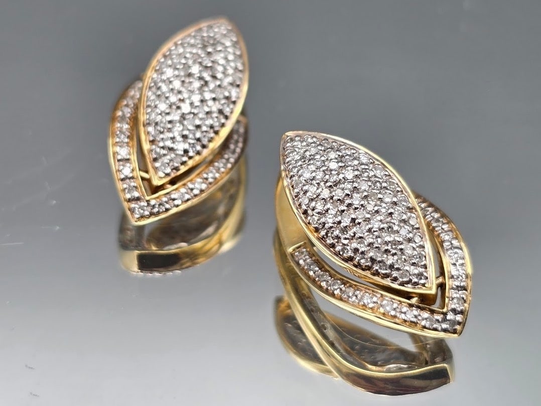14K Marquise-shaped Pave Diamond Earrings: A pair of 14K yellow gold earrings of marquise shape with split shank design and pave diamonds. 7/8in tall x 3/8in wide. 3.40 dwt. | You have additional shipping options, and are not required to use L