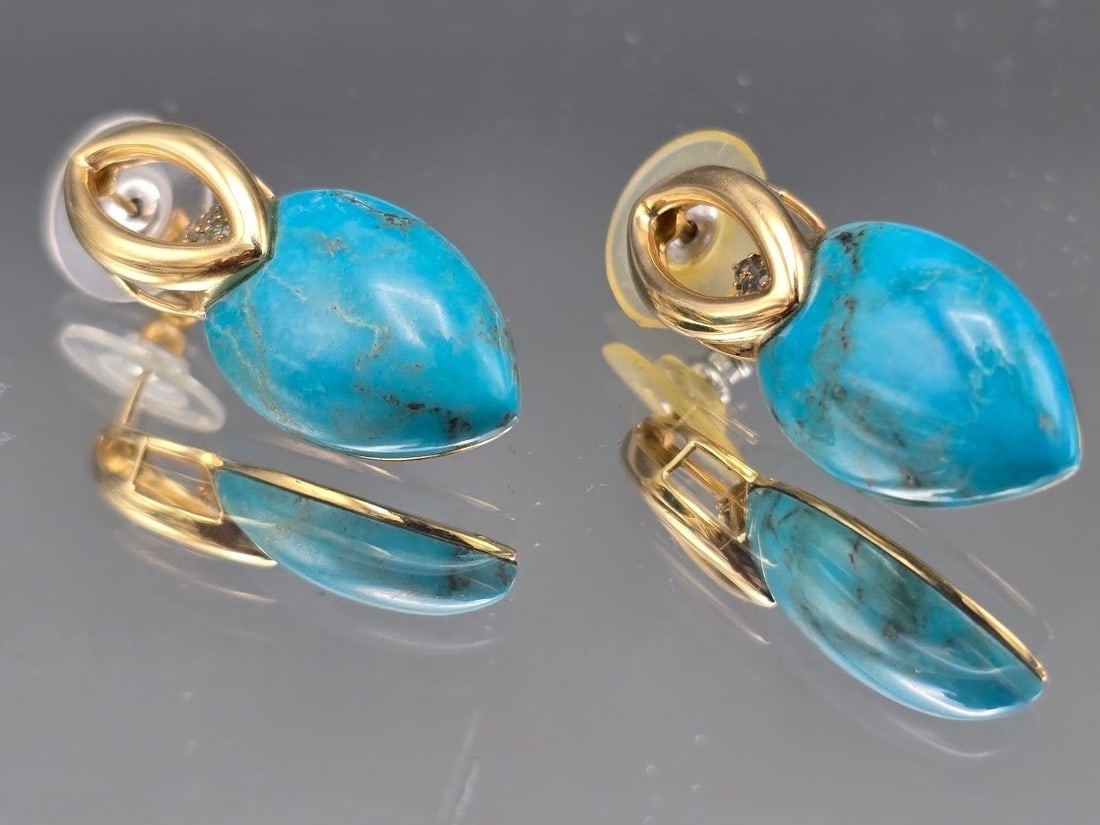 14K Turquoise Teardrop Earrings: A pair of 14K yellow gold earrings with large turquoise teardrop stones and blue glass cluster accents. Marked 14K. 1in tall x 1/2in wide. 5.59 dwt. | You have additional shipping options, and are not