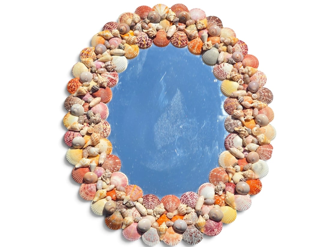 Oval Shell-Framed Wall Mirror: An oval framed coastal shell wall mirror. | You have additional shipping options, and are not required to use Live Shipping. Additional shipping and delivery details are available on our website: Brig
