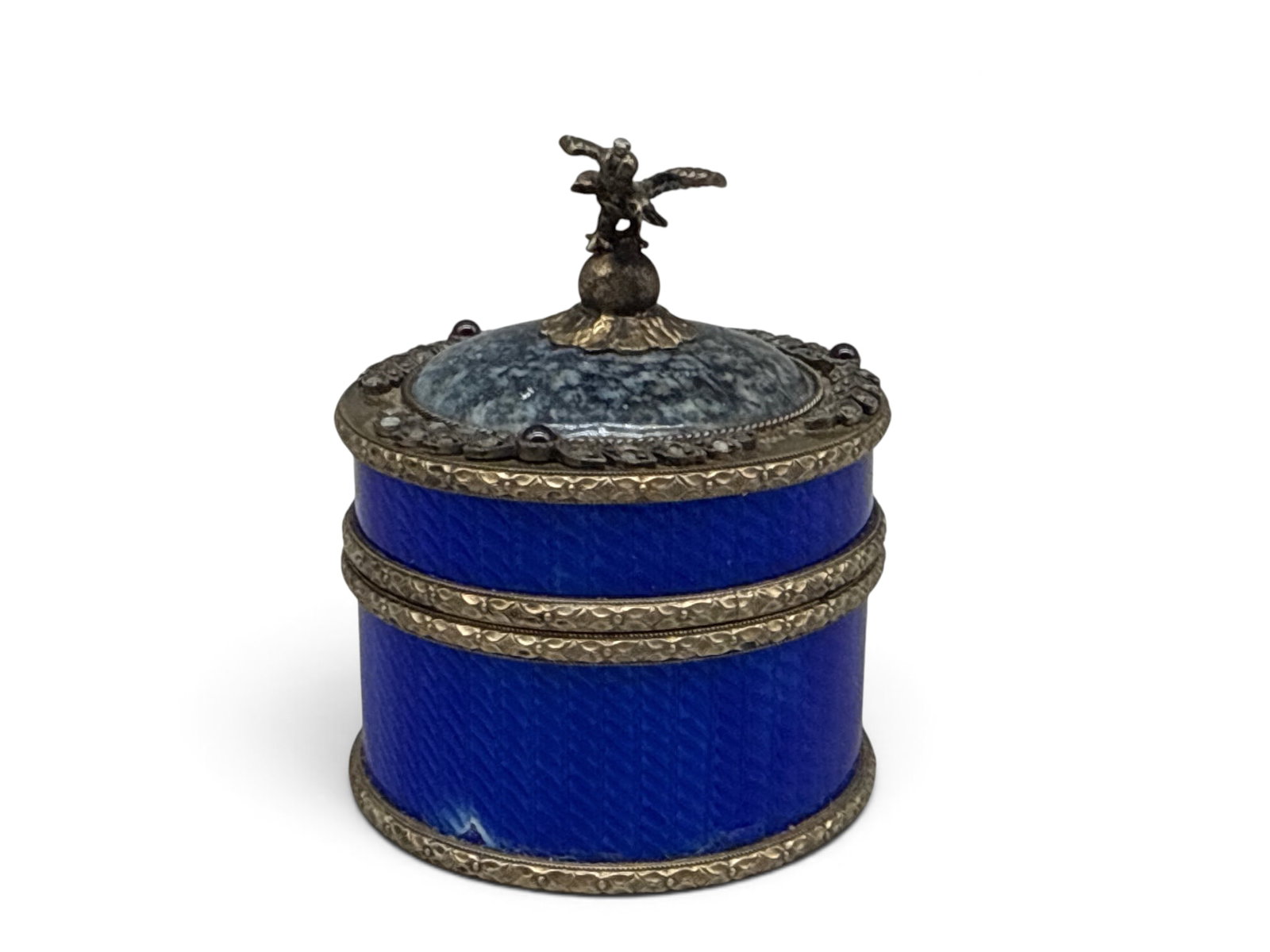 Imperial Russian Enameled Silver Trinket Box: A 19th C. Russian guilloche enameled silver trinket box of round form, with mine cut diamonds inset in laurel leaves with three pink quartz cabochons. Blue marble top is finished with a silver, imperi