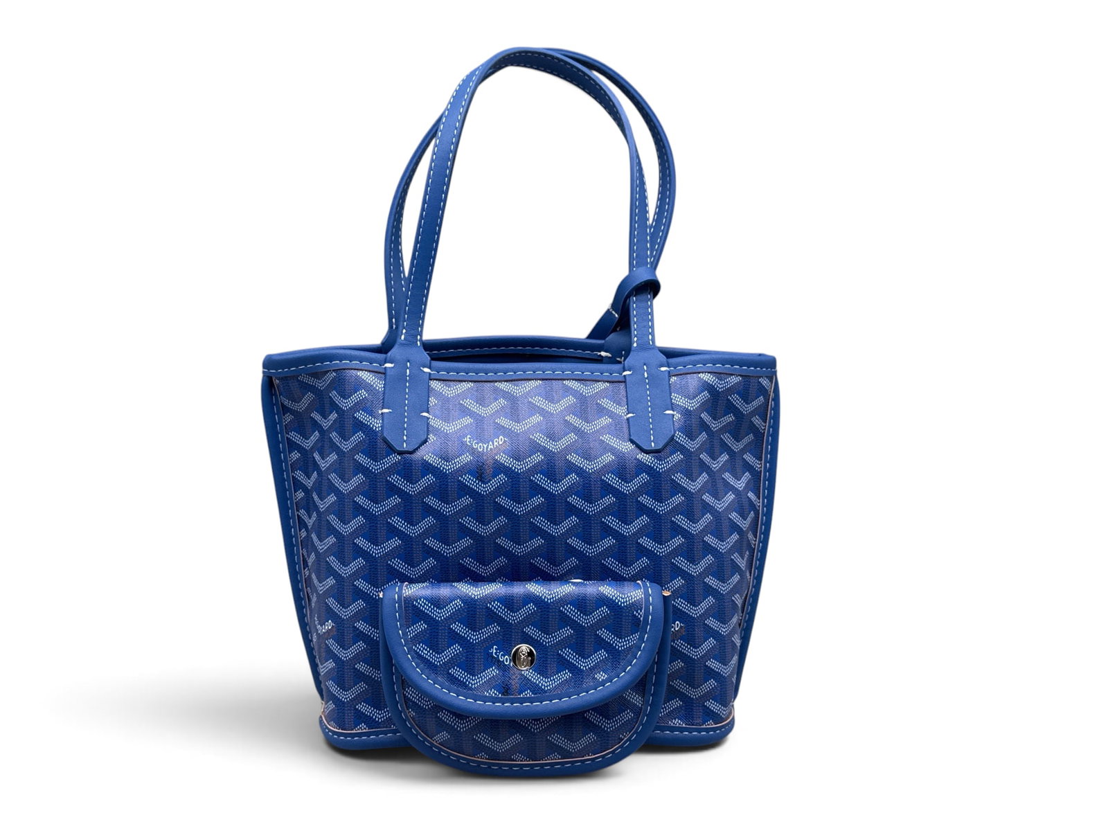 Goyard Anjou Mini and Coin Purse: A Goyard Anjou mini in cobalt blue leather with geometric print, and a matching coin purse. Marked Goyard on interior. 8in tall x 10in wide. | You have additional shipping options, and are not