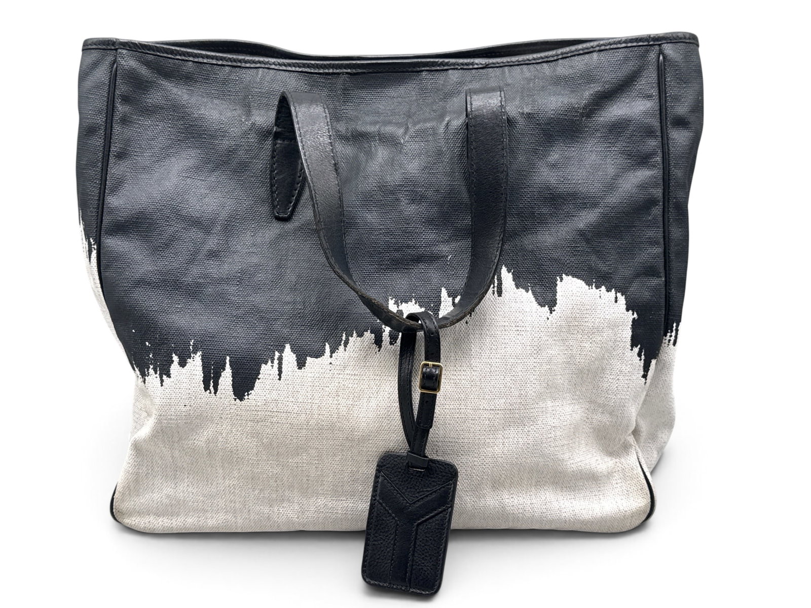 Yves Saint Laurent Raspail Cascade Print Tote: An Yves Saint Laurent Raspail Cascade printed canvas tote with black leather straps. Yves Saint Laurent Rive Gauche tag on interior, marked YSL underneath. 13in tall x 14in wide. | You have