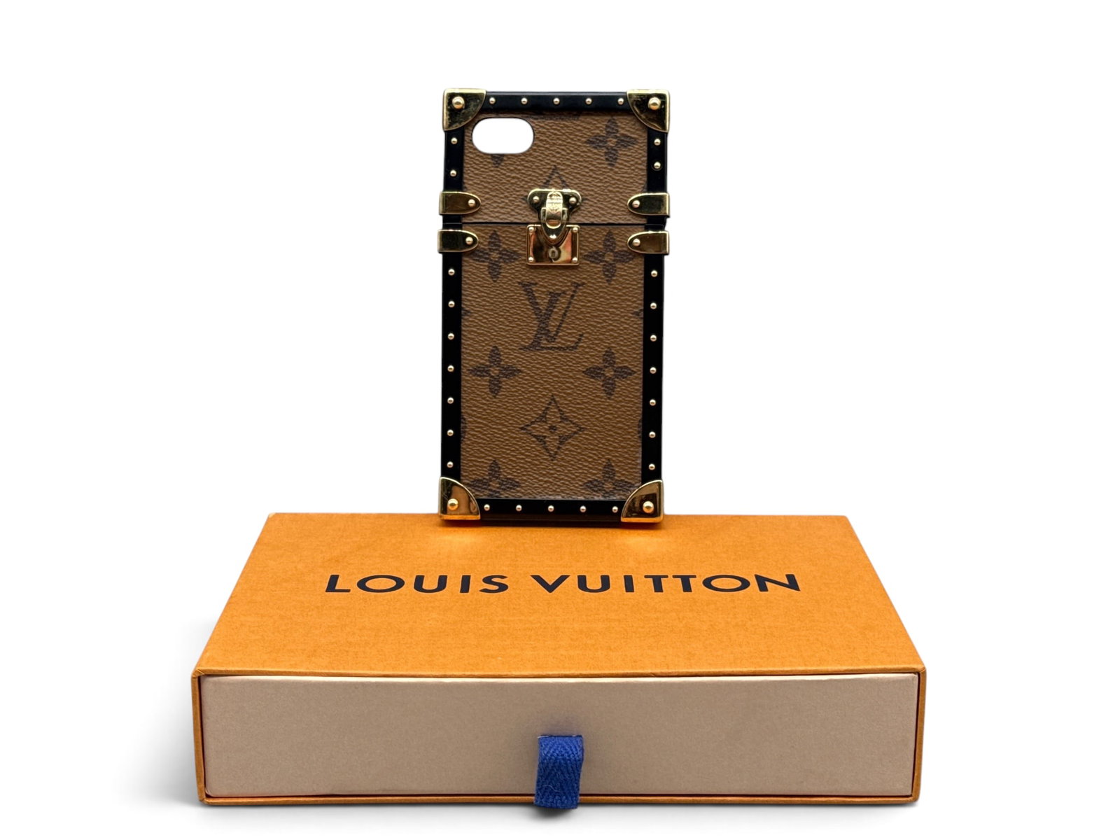 Louis Vuitton Monogram Phone Case: A Louis Vuitton monogram phone case with black lacquered exterior and gold-tone hardware. Case is marked on interior. Includes original fitted box, and dust cloth bag. 6in tall x 3in wide. | You have 