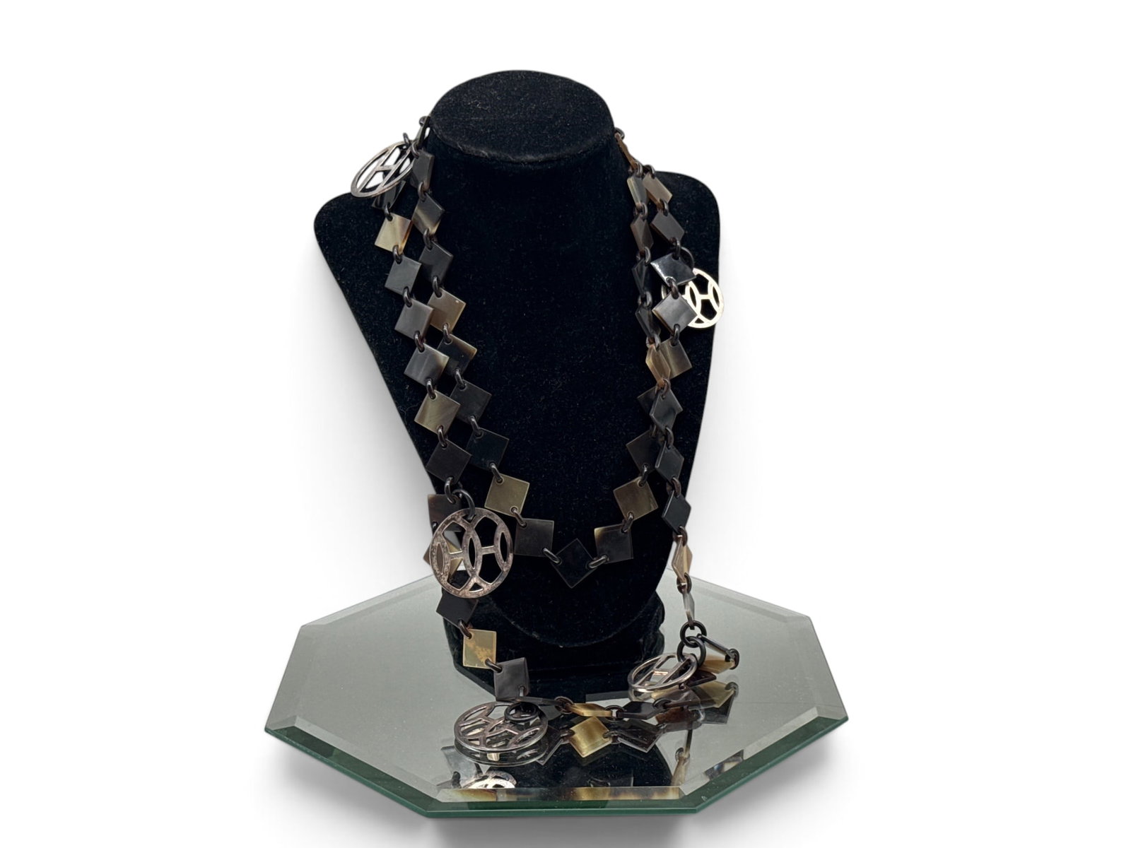 Hermes Buffalo Horn and Lacquer Lena Necklace: An Hermes buffalo horn and lacquer Lena necklace with diamond-shaped geometric links and signature "H" medallions. 46in long. | You have additional shipping options, and are not required to use Live