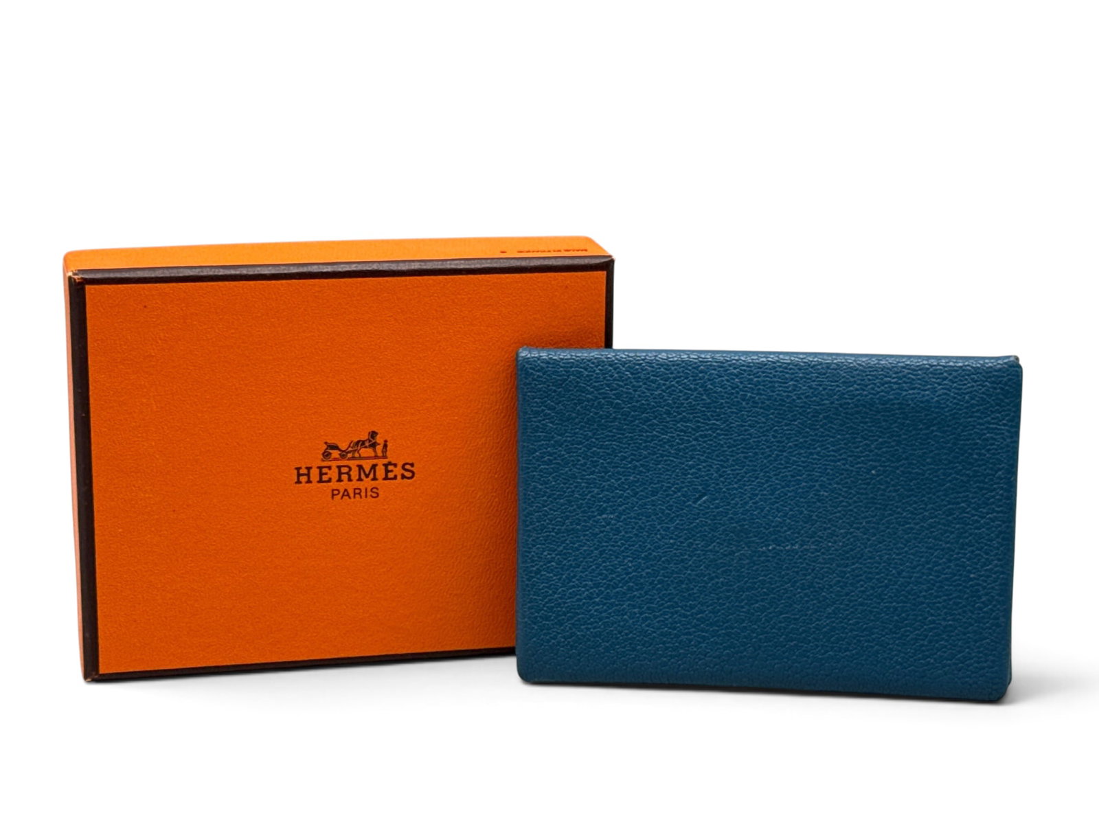 Hermes Cerulean Calvi Card Holder: An Hermes Calvi card holder in cerulean, epsom calfskin. Marked Hermes on interior. Includes Hermes box. 4.1in tall x 2.8in wide. | You have additional shipping options, and are not required to use Li