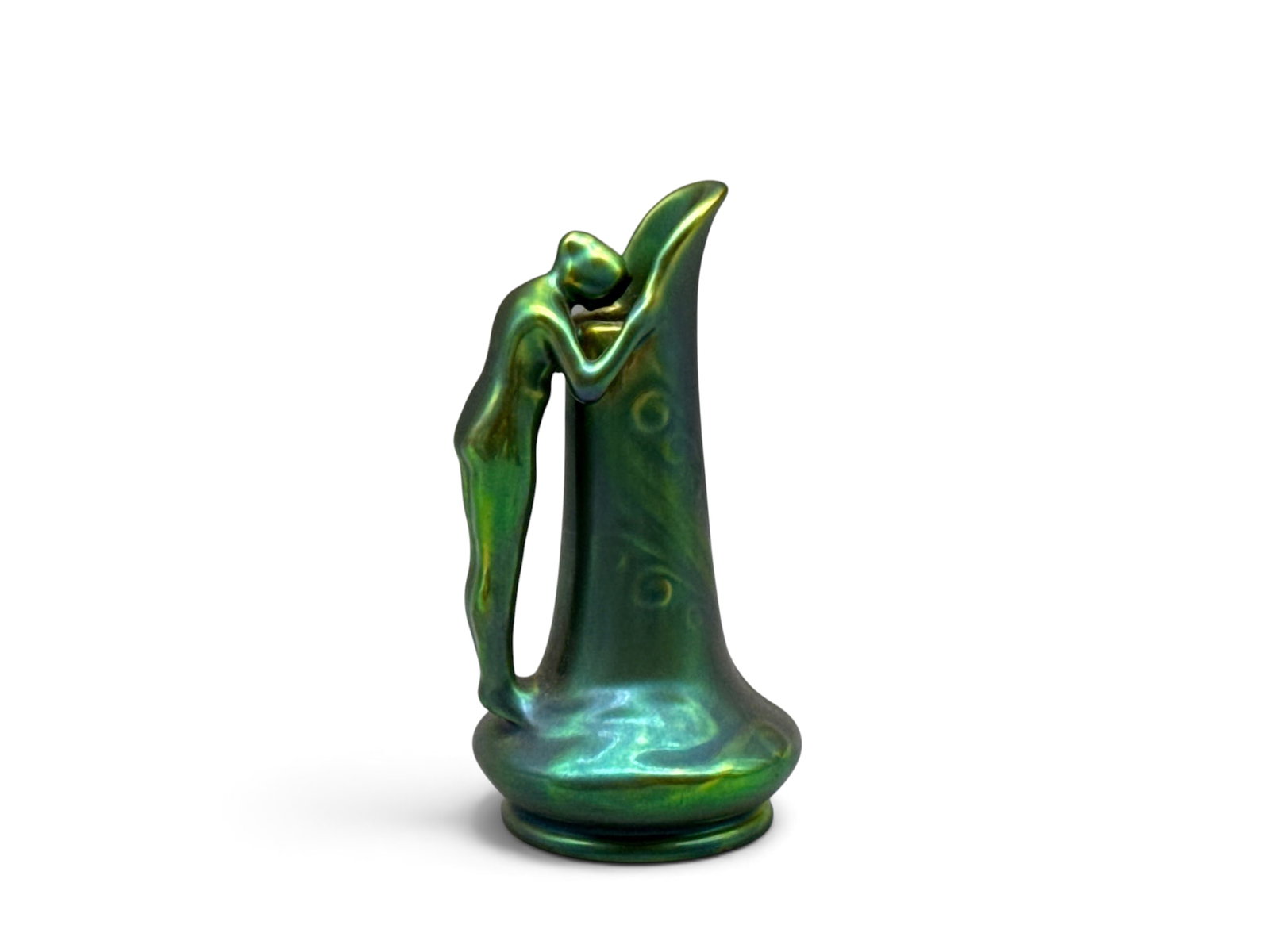 Zsolnay Eosin Figural Ewer: A Zsolnay Eosin of Hungary Art Nouveau porcelain ewer or vase in an iridescent green glaze with figural woman draped around the neck. Marked. 5in tall x 2-1/2in wide. | You have additional shipping op