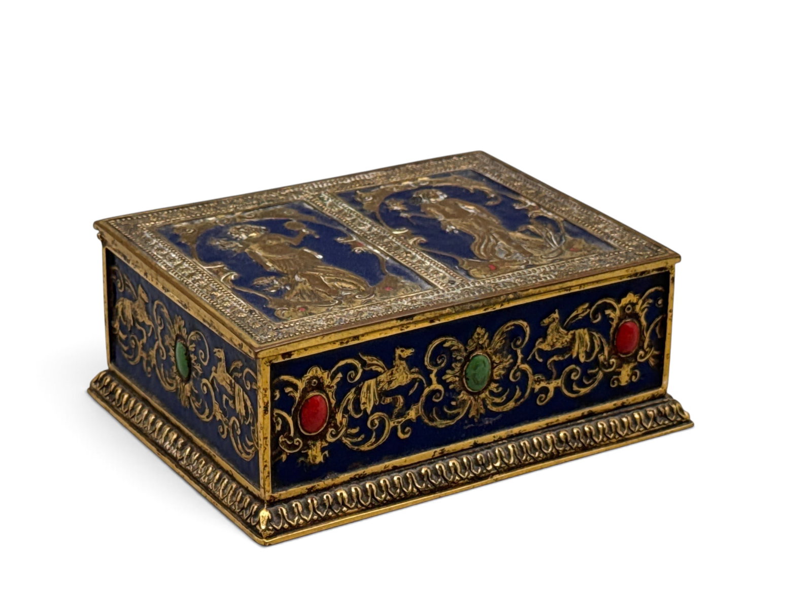 French 19th C. Bronze Enameled Trinket Box: A French 19th C. bronze enameled trinket box with fitted wood interior and two neoclassical figures surrounded by ormolu decoration of filigree and winged horses. 2in tall x 5in wide. | You have