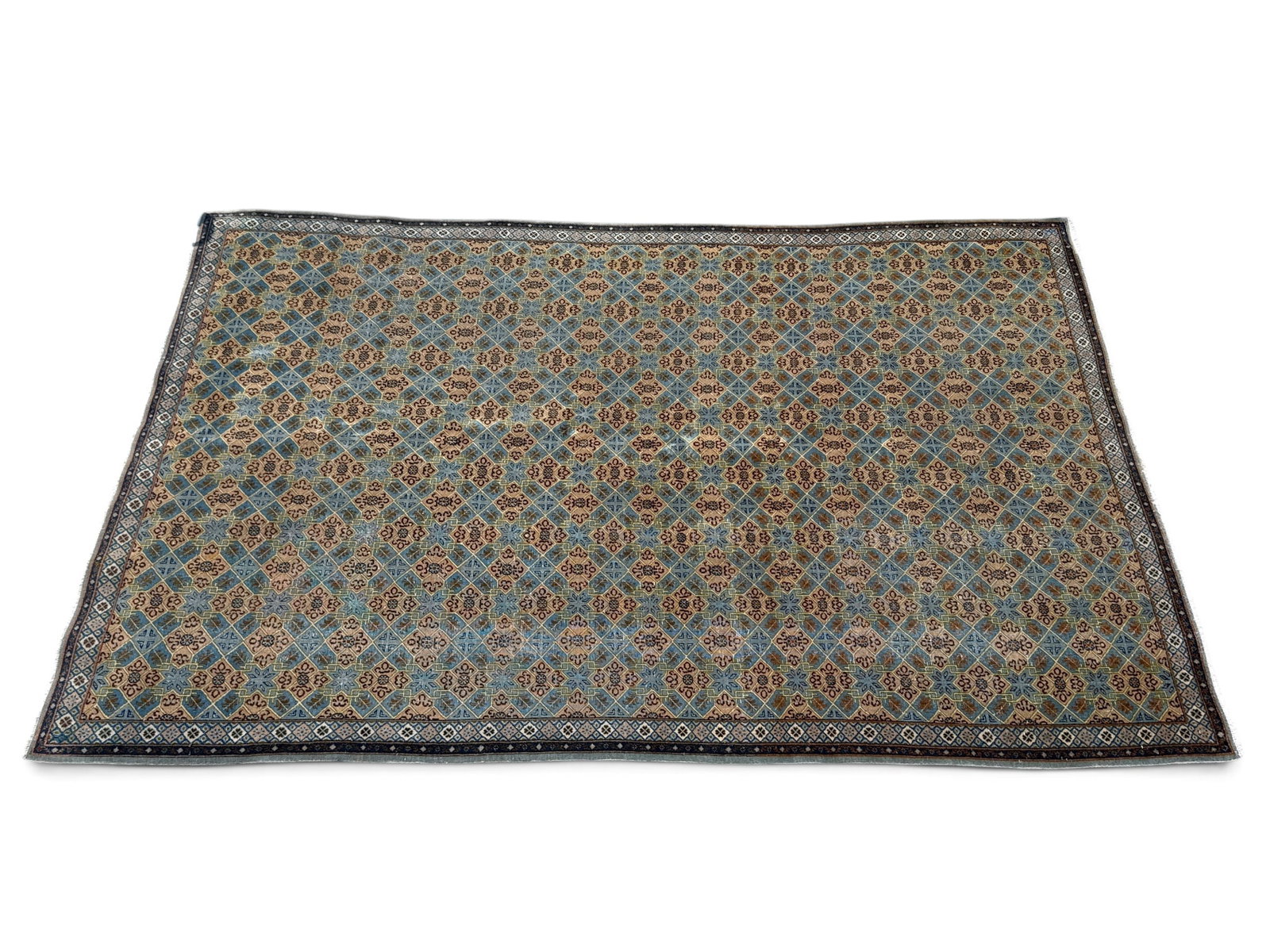 Hand-Knotted Turkish Carpet, 10ft 6in x 6ft 10in: A Turkish room-size carpet with a repeating design on blue and tan ground. 10ft 6in x 6ft 10in. | You have additional shipping options, and are not required to use Live Shipping. Additional shipping a
