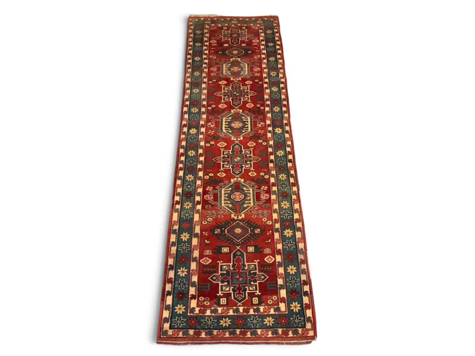 Hand-Knotted Turkish Caucasian Medallion Runner: A Turkish Caucasian medallion runner with a geometric motif. 12ft 9in x 3ft 9in. | You have additional shipping options, and are not required to use Live Shipping. Additional shipping and delivery det