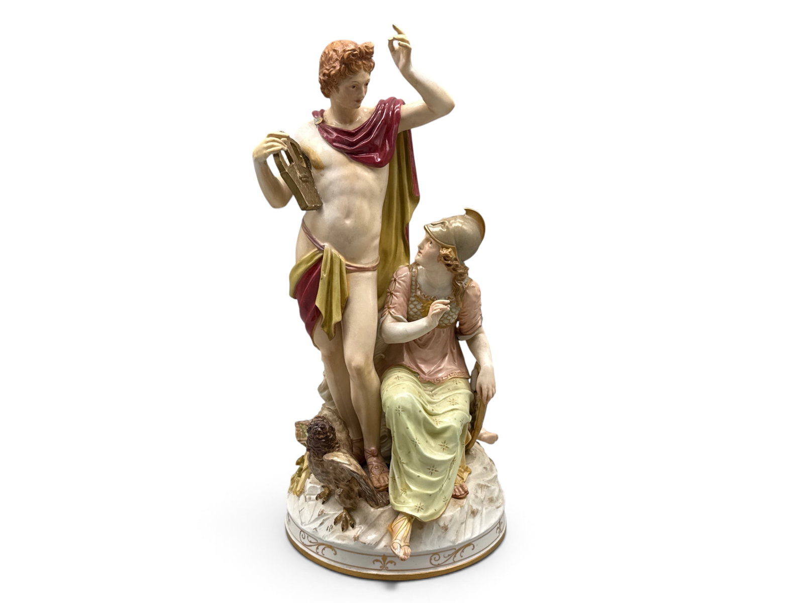 KPM Porcelain Apollo and Athena Figure: A KPM hand-painted porcelain figure depicting the Greek mythological figures Apollo and Athena, flanked by a hawk and Cupid. Marked KPM. 14in tall x 7in wide. | You have additional shipping options, a