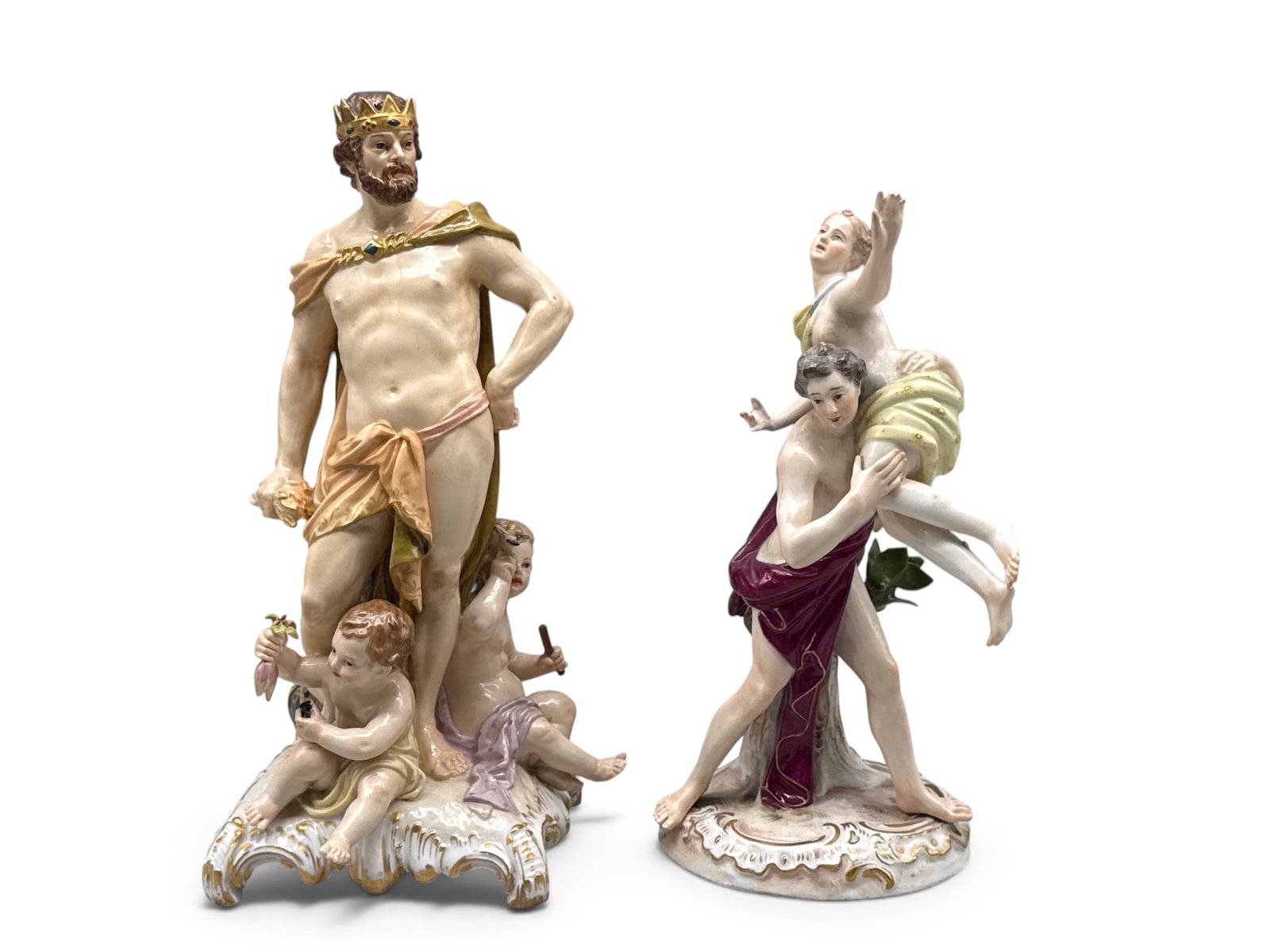 Two Meissen Mythological Porcelain Figures: To include Hercules with two babes and The Abduction of the Sabine. With makers marks. 9in tall x 3in wide. | You have additional shipping options, and are not required to use Live Shipping. Additiona