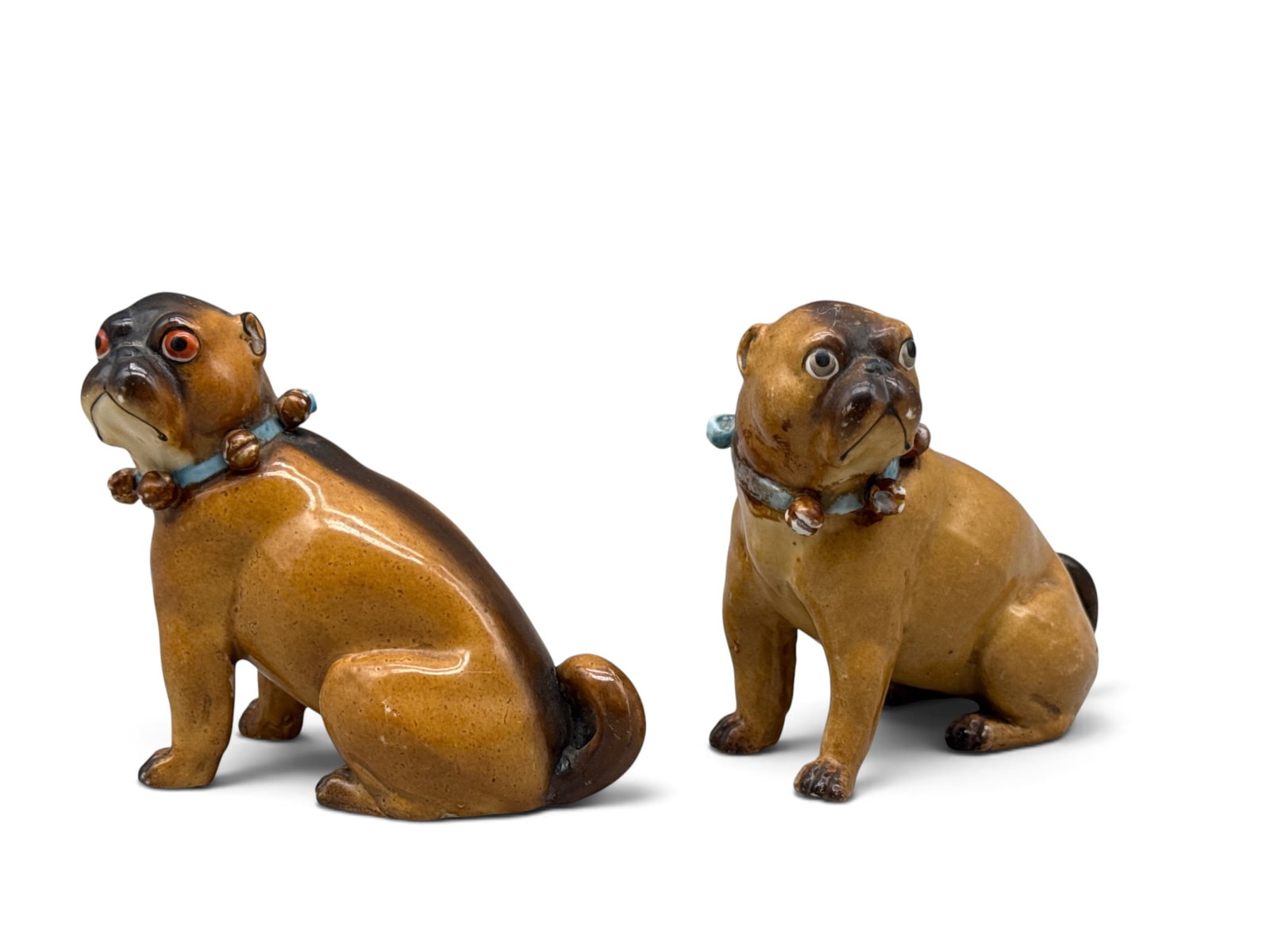 19th C. German Porcelain Pug Figures: A pair of 19th C. German porcelain pugs with bell collars. 4-1/2in tall x 4in wide. | You have additional shipping options, and are not required to use Live Shipping. Additional shipping and delivery 
