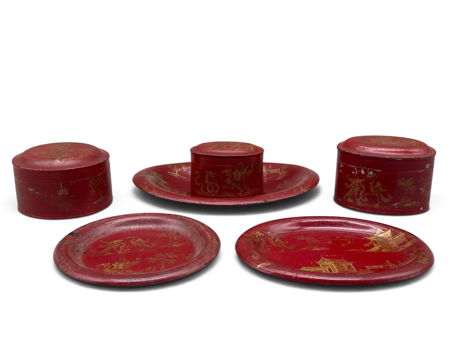 Chinoiserie Gilt-Decorated Toleware: A six-piece collection of Chinoiserie gilt-decorated vermilion red toleware to include three trays and three lidded vessels, each with genre scenes and exotic birds. Largest: 2in tall x 3in wide. | Yo