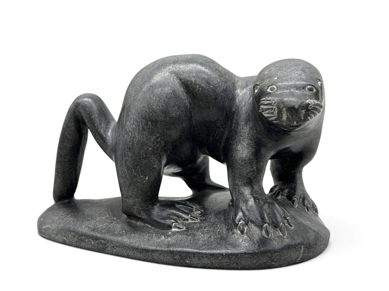 Abraham Neaquk Inuit Carved Otter: Abraham Neaquk (Inuit / Nunavik, 1927-1994). A large carved stone sculpture of an otter. Signed and dated 1990. 6in tall x 9in wide. | You have additional shipping options, and are not required to use