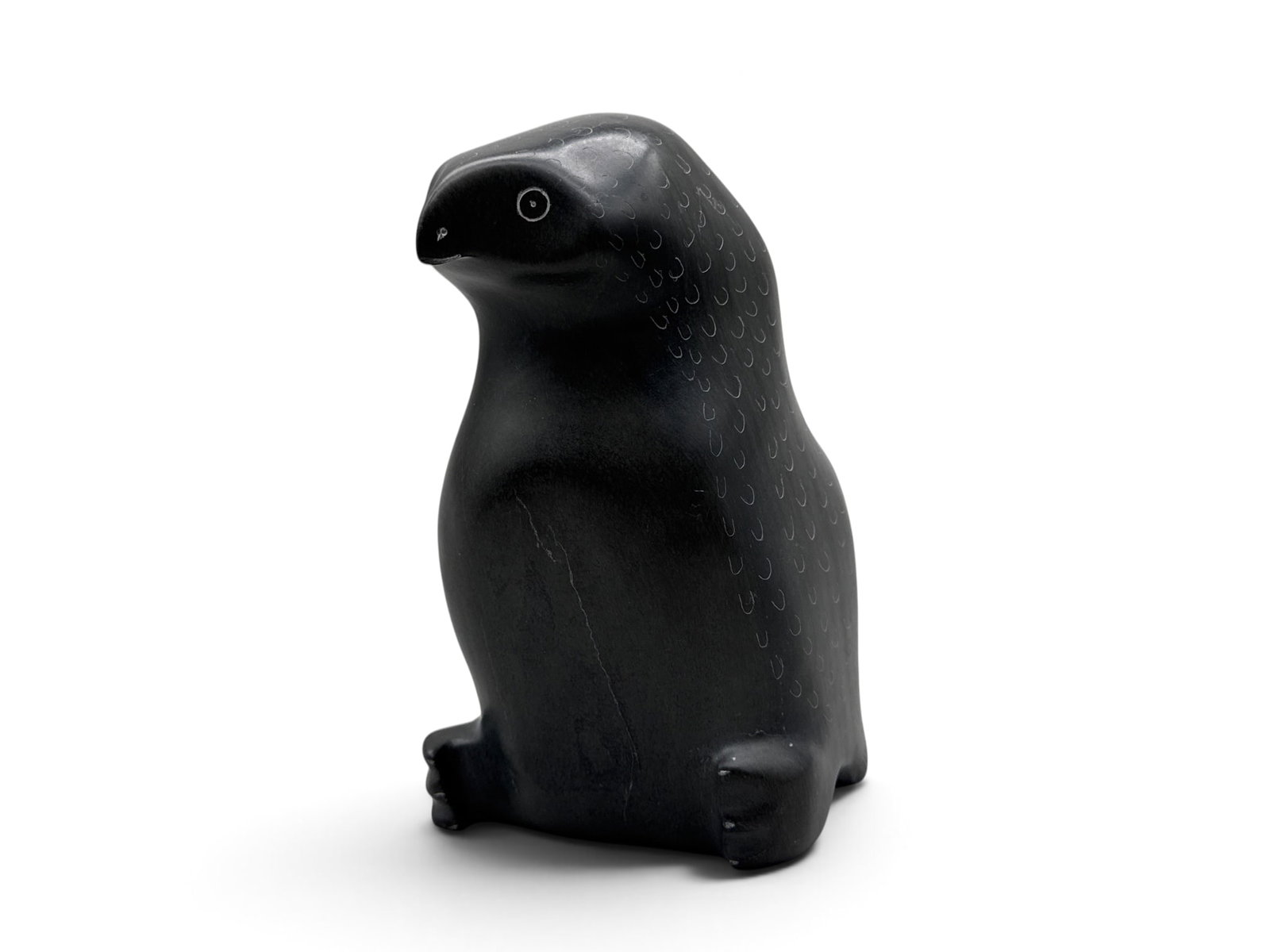 Joanassie Iqualuk Inuit Carved Owl: A Joanassie Iqualuk Inuit carved stone sculpture of an owl. Unsigned. 6-3/4in tall x 4-1/2in wide. | You have additional shipping options, and are not required to use Live Shipping. Additional shippin
