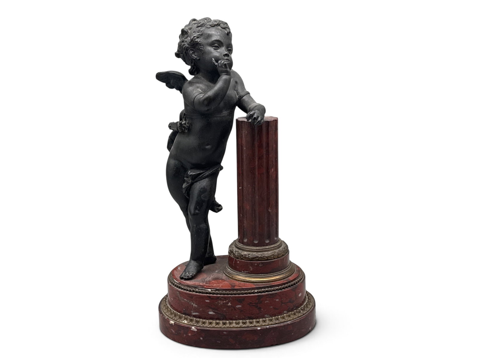 19th C. Patinated Metal Cupid Figure and Marble Column: A 19th C. patinated metal cupid figure leaning against a rouge marble column, terminating on marble base. 16in tall x 8in wide. | You have additional shipping options, and are not required to use Live