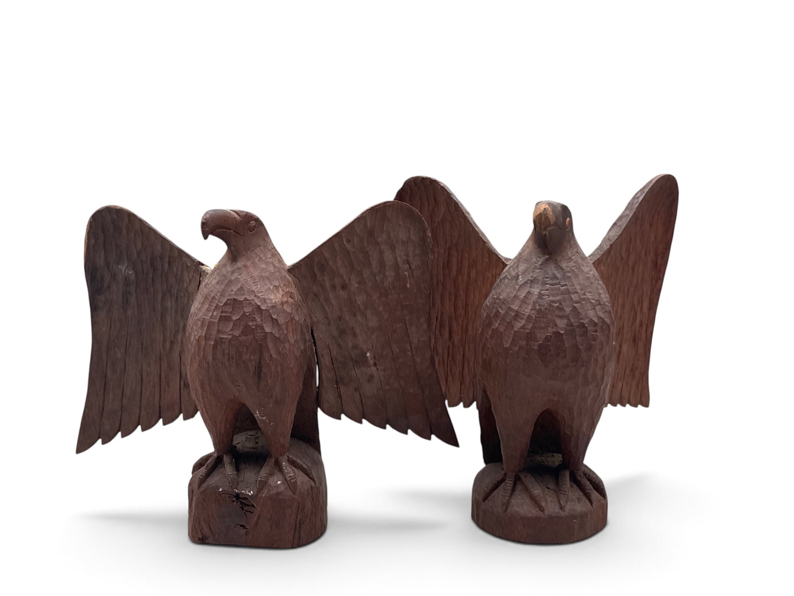 Pair of Chip Carved Folk Art Wooden Eagles: Two folk art chip-carved wingspread eagles. Signed "H.W.". 10in tall x 9in wide. | You have additional shipping options, and are not required to use Live Shipping. Additional shipping and delivery det