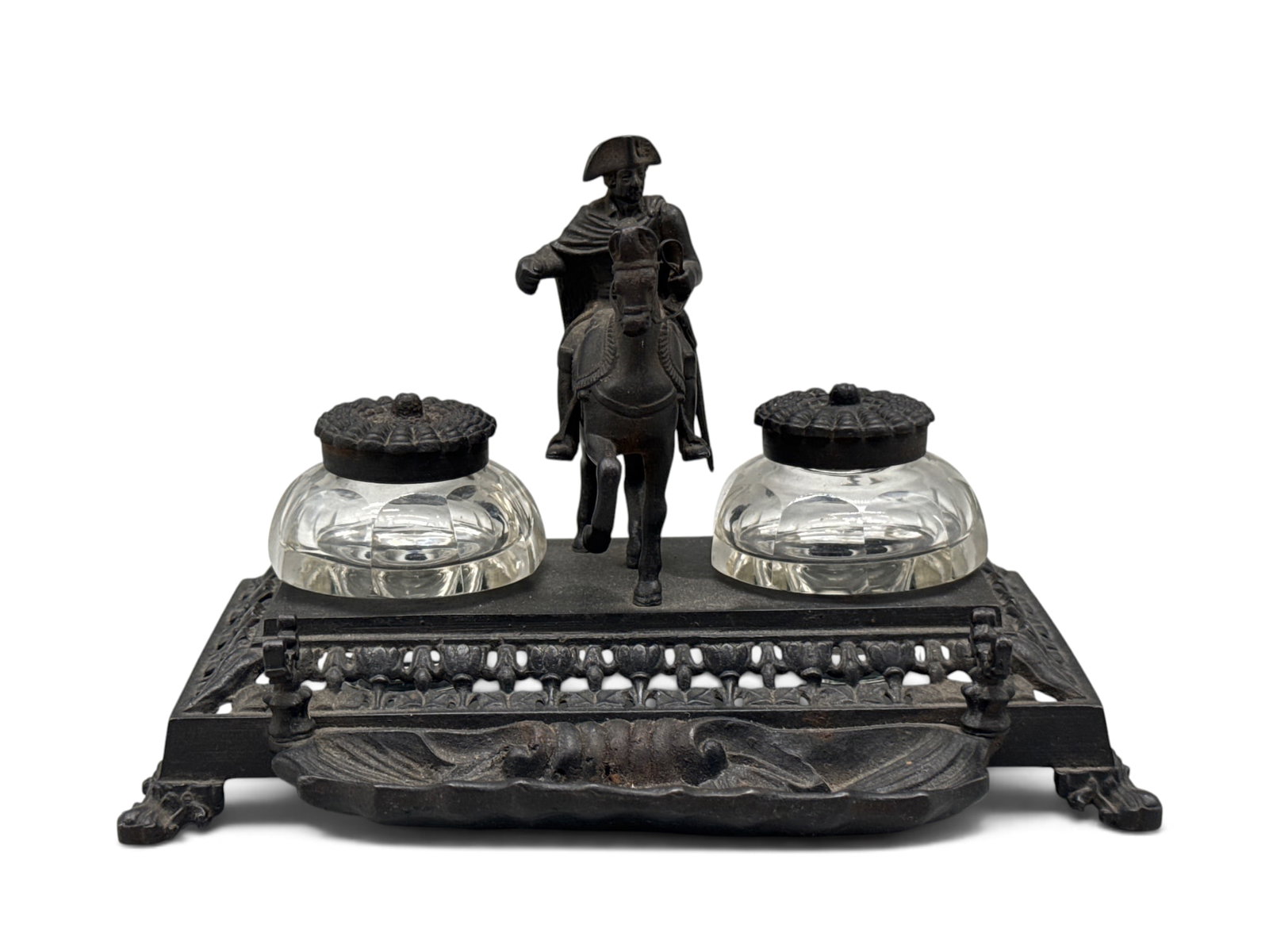 Cast Iron Napoleon-Form Inkwell: An ornate cast iron double inkwell with glass inserts and Napoleon figure on horseback. 6in tall x 6-1/2in wide. | You have additional shipping options, and are not required to use Live Shipping. Addi