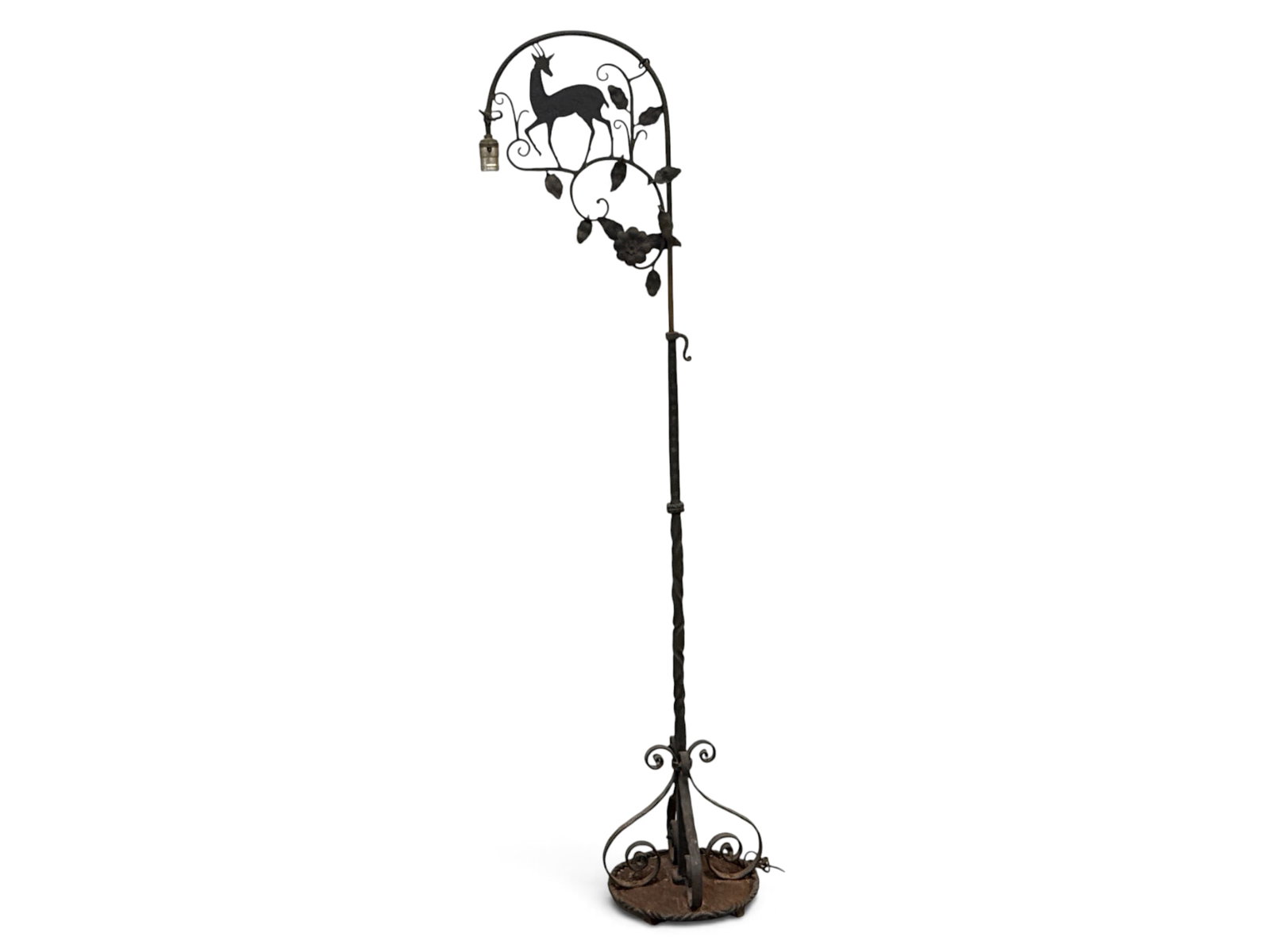 Manner of William Hunt Diederich Iron Floor Lamp: A wrought iron gooseneck floor lamp with a stylized deer and floral design in the manner of William Hunt Diederich. Adjustable height. As photographed: 62-1/2in tall x 19in wide. | You have