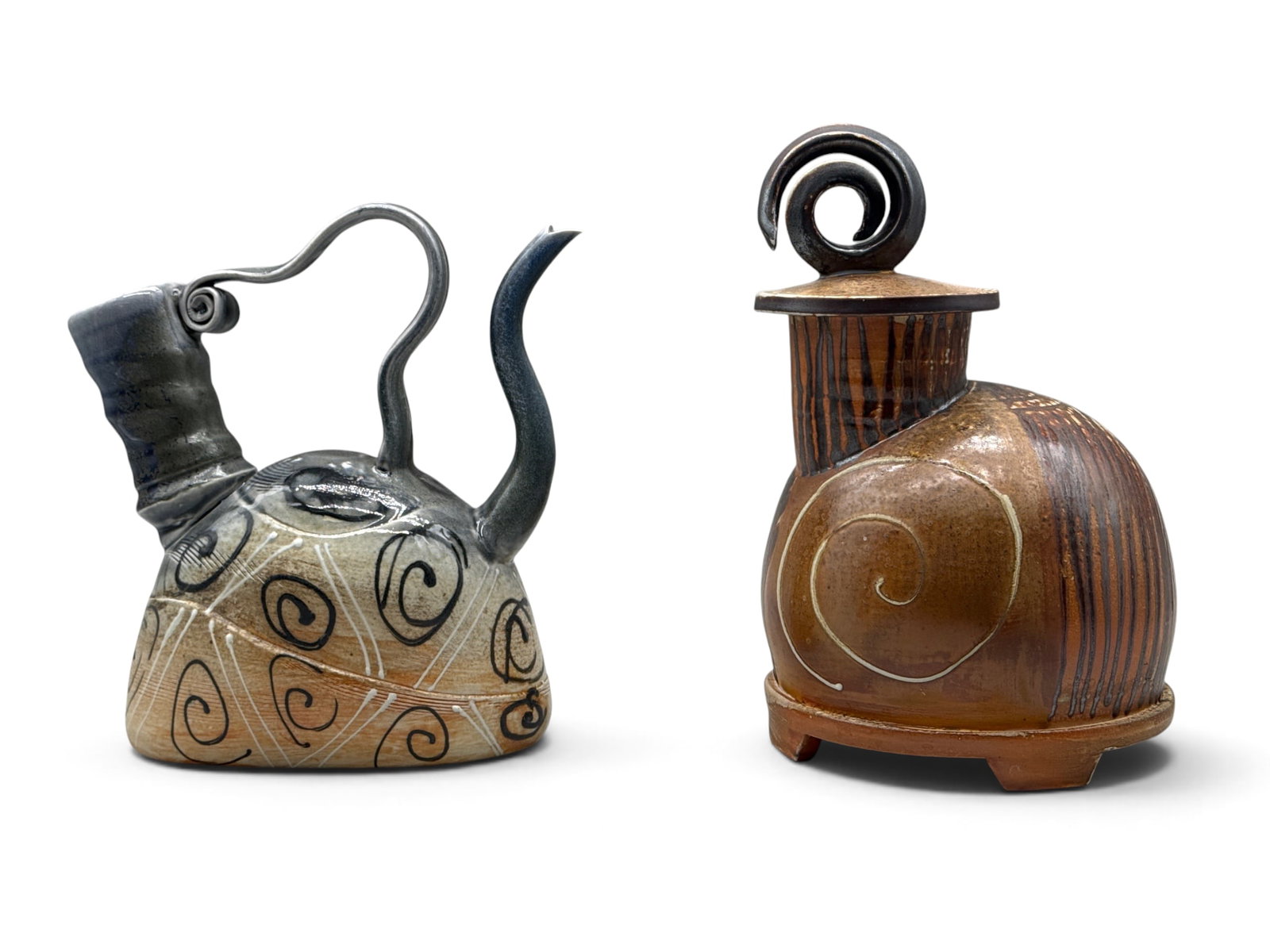 Two Alan Willoughby Porcelain Vessels: Alan Willoughby (American, 20th C.). Two studio porcelain vessels to include a ginger jar with slip glazing and lid, and an ewer-form teapot. Both are signed. | You have additional shipping options, a