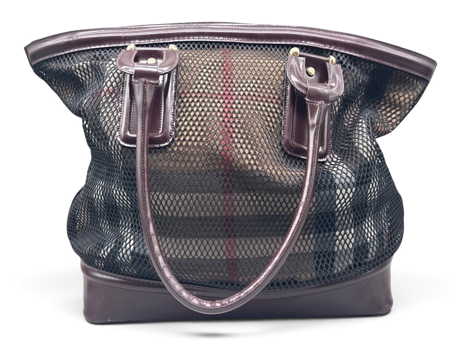 Burberry Prorsum Mesh and Patent Leather Tote: A Burberry Prorsum mesh and burgundy patent leather tote bag with snap closure and interior with a removable check insert. Interior features Burberry Prorsum label. 15in tall x 19in wide. | You have a