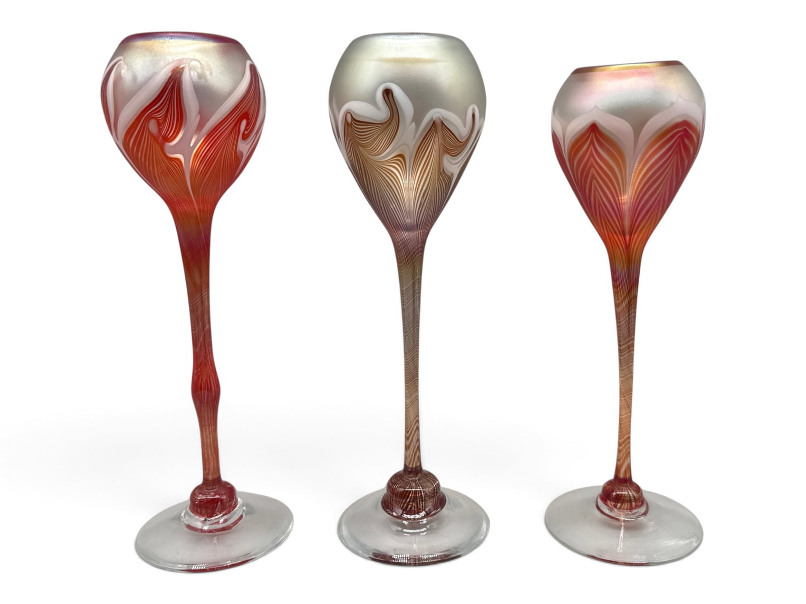 Three Vandermark Art Glass Chalices: To include two red with pulled feather design, both signed, and one brown pulled feather chalice, unsigned. Largest: 12in tall x 3in wide. | You have additional shipping options, and are not required 
