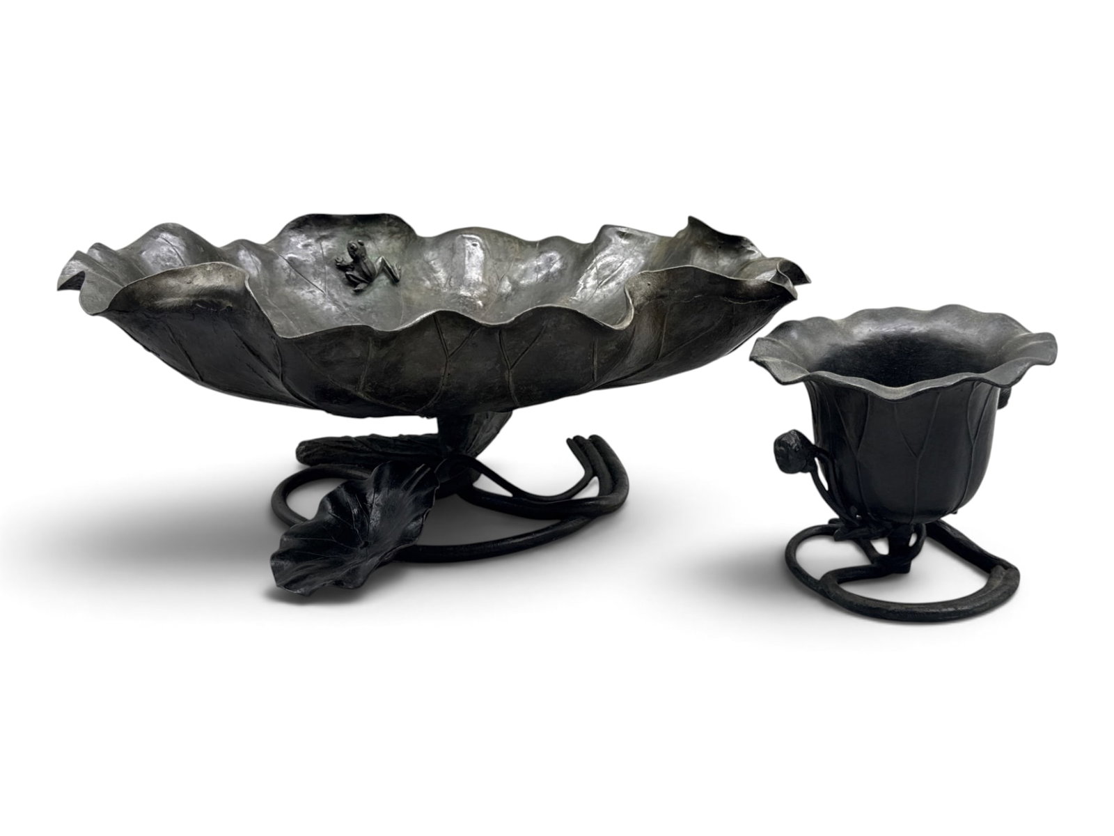 Two Japanese Meiji-style Bronze Lotus-Form Bowls: Two Japanese Meiji style bronze lotus form bowls raised on bases of entwined stems, with small frog accent. Larger: 7in tall x 17in wide. | You have additional shipping options, and are not required