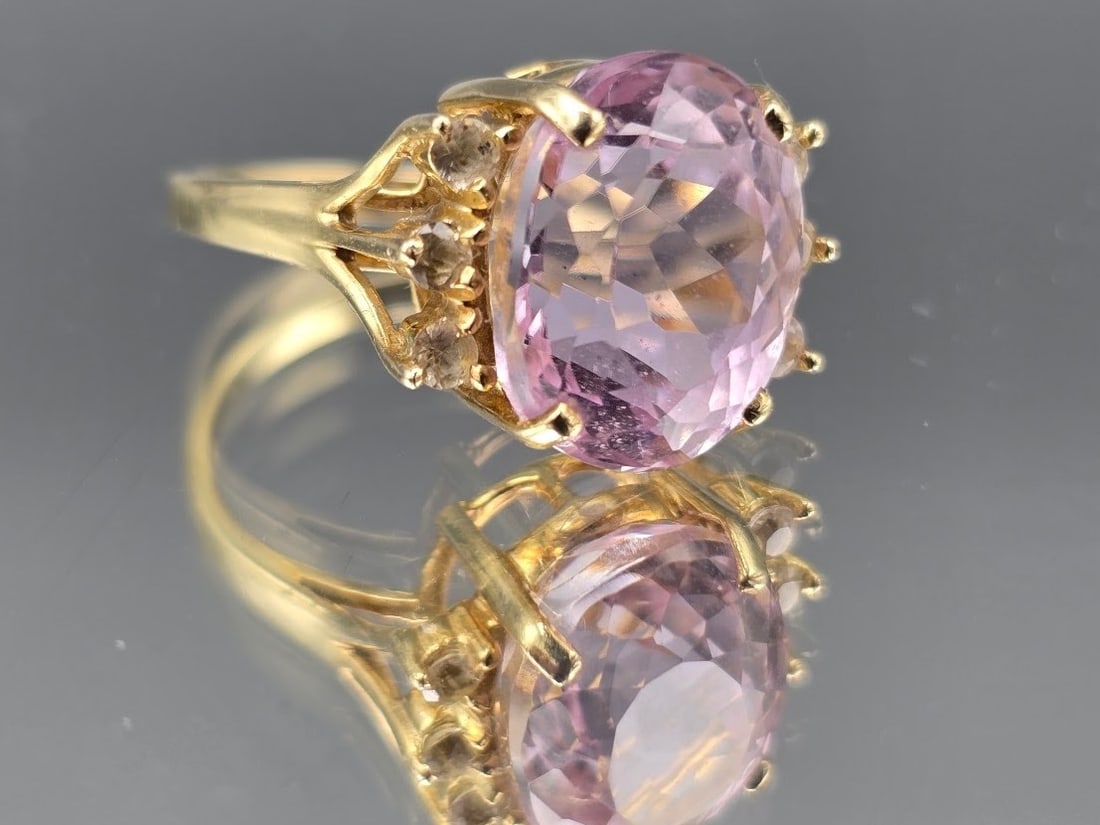 14K Oval Cut Pink Kunzite and Diamond Ring: A 14K yellow gold ring with oval cut pink kunzite stone flanked by three diamonds on each side. Marked 14K. Size 6. 3.27 dwt. | You have additional shipping options, and are not required to use Live S