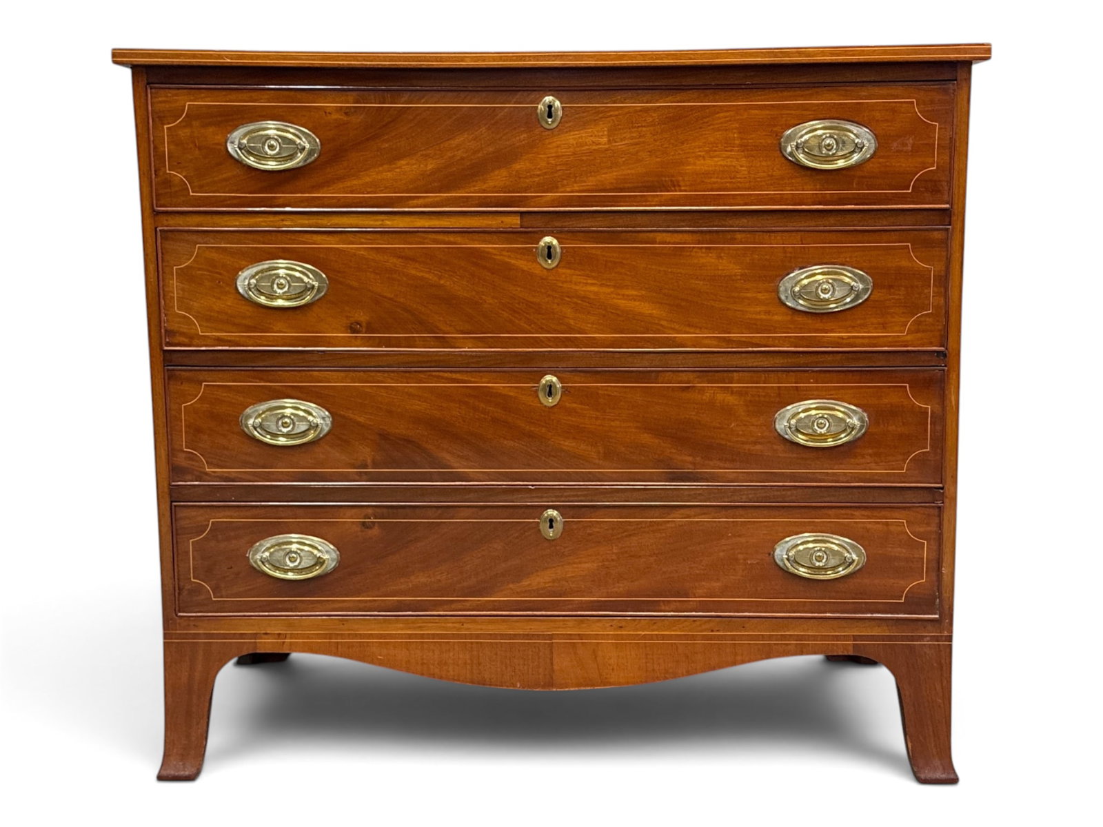American Federal Mahogany Four-Drawer Chest: An American Federal four-drawer chest of drawers with line inlay and French flared feet. 35-1/2in tall x 40in wide x 20in deep. | You have additional shipping options, and are not required to use Live