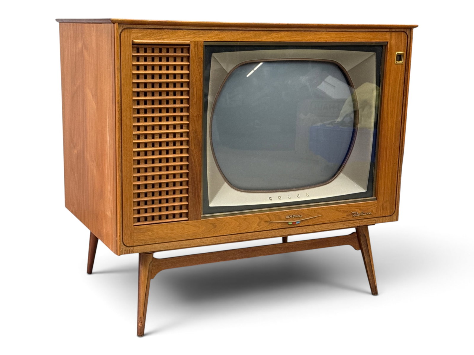 Midcentury Modern RCA-Victor Television: A midcentury modern RCA-Victor television with walnut case on tapering legs. Case: 34-1/2in tall x 38-1/4in wide x 23-1/4in deep. | You have additional shipping options, and are not required to use Li