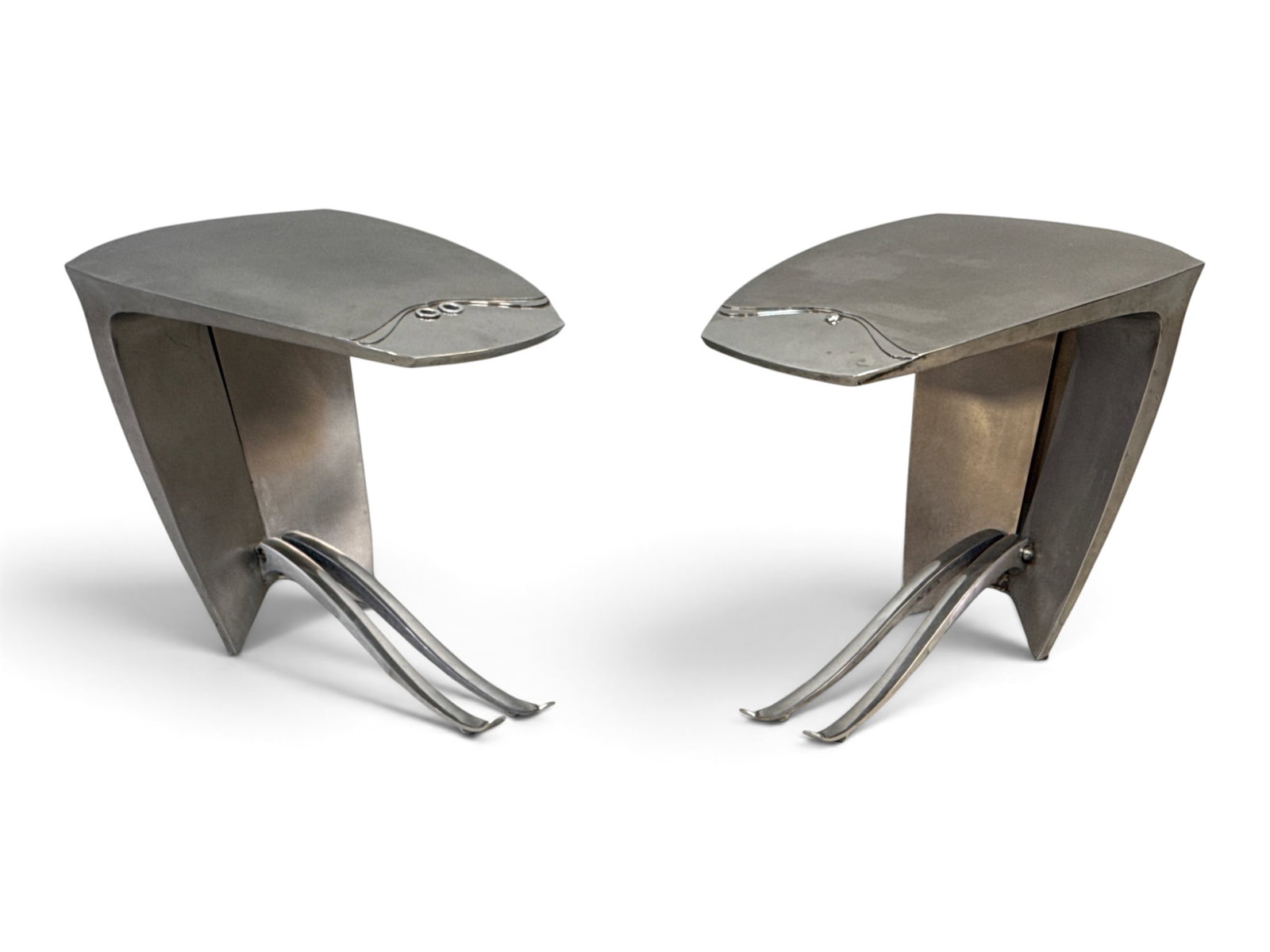 Pair of Rick Allison Modernist Metal Side Tables: A pair of Rick Allison signed modernist brushed metal drinks or side tables on cantilever bases. 17-1/2in tall x 25in wide x 14in deep. | You have additional shipping options, and are not required to