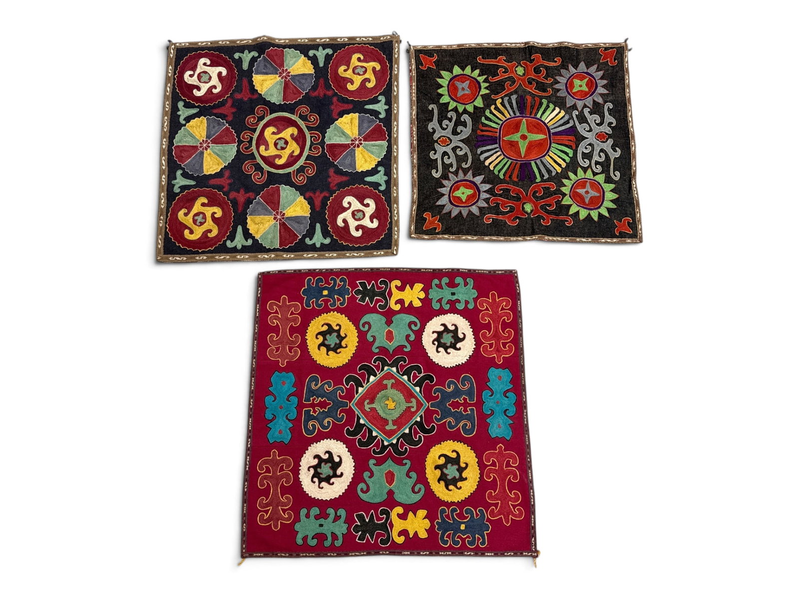 Three Uzbek Lakai Embroidered Textiles: Three Uzbek Lakai embroidered textiles. Largest 26in x 26in. | You have additional shipping options, and are not required to use Live Shipping. Additional shipping and delivery details are available o