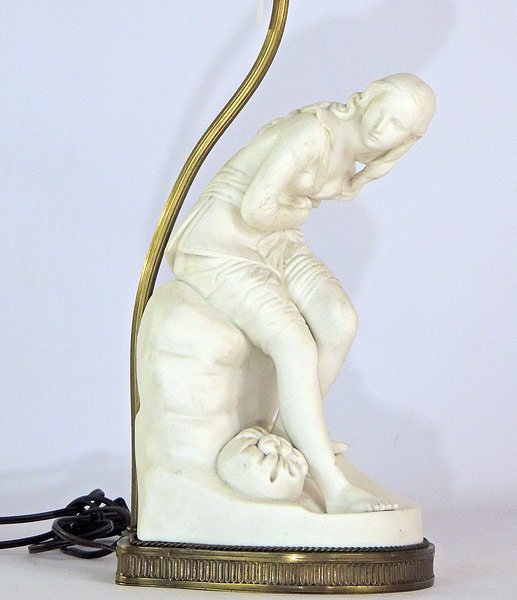 English Parian Porcelain: English Parian porcelain figurine of seated woman, fitted to a lamp. Hallmarked on reverse. Figure: 12-1/2" tall.