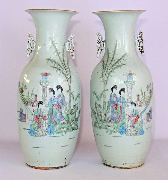 Pair of Chinese Porcelain Vases: Pair of Chinese porcelain vases with applied handles and Mandarin pastoral scenes with geisha. 23” tall.